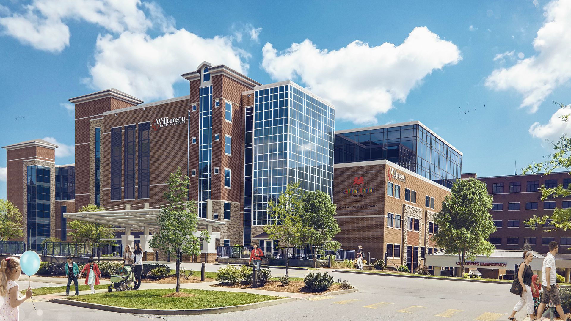 A rendering shows planned improvements to Williamson Medical Center. The red brick building is bookended by two taller towers.