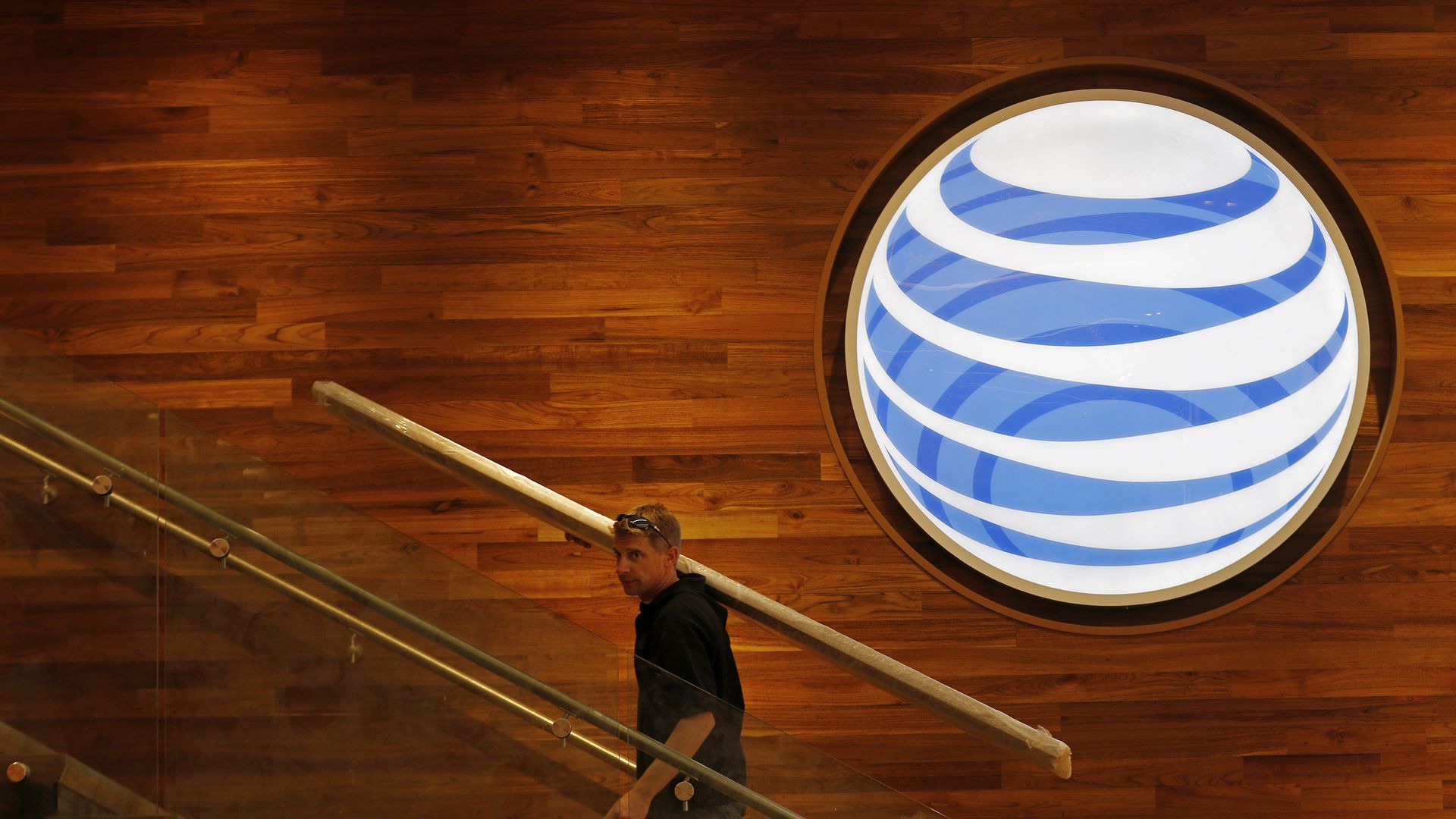 ATT logo with man walking by.