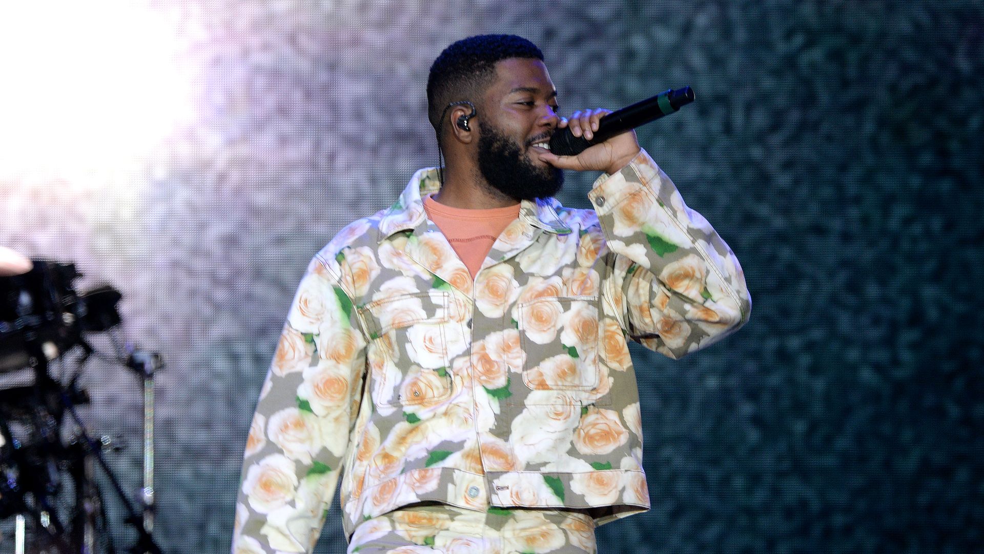 R&B singer Khalid performs on stage.