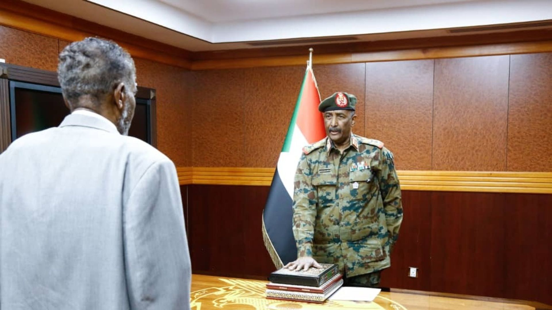 Sudan's army head Gen. Abdel Fattah al-Burhan swear in as he issued a decree to form a new transitional Sovereign Council, appointing himself its chairman in Khartoum, Sudan on November 11, 2021. 