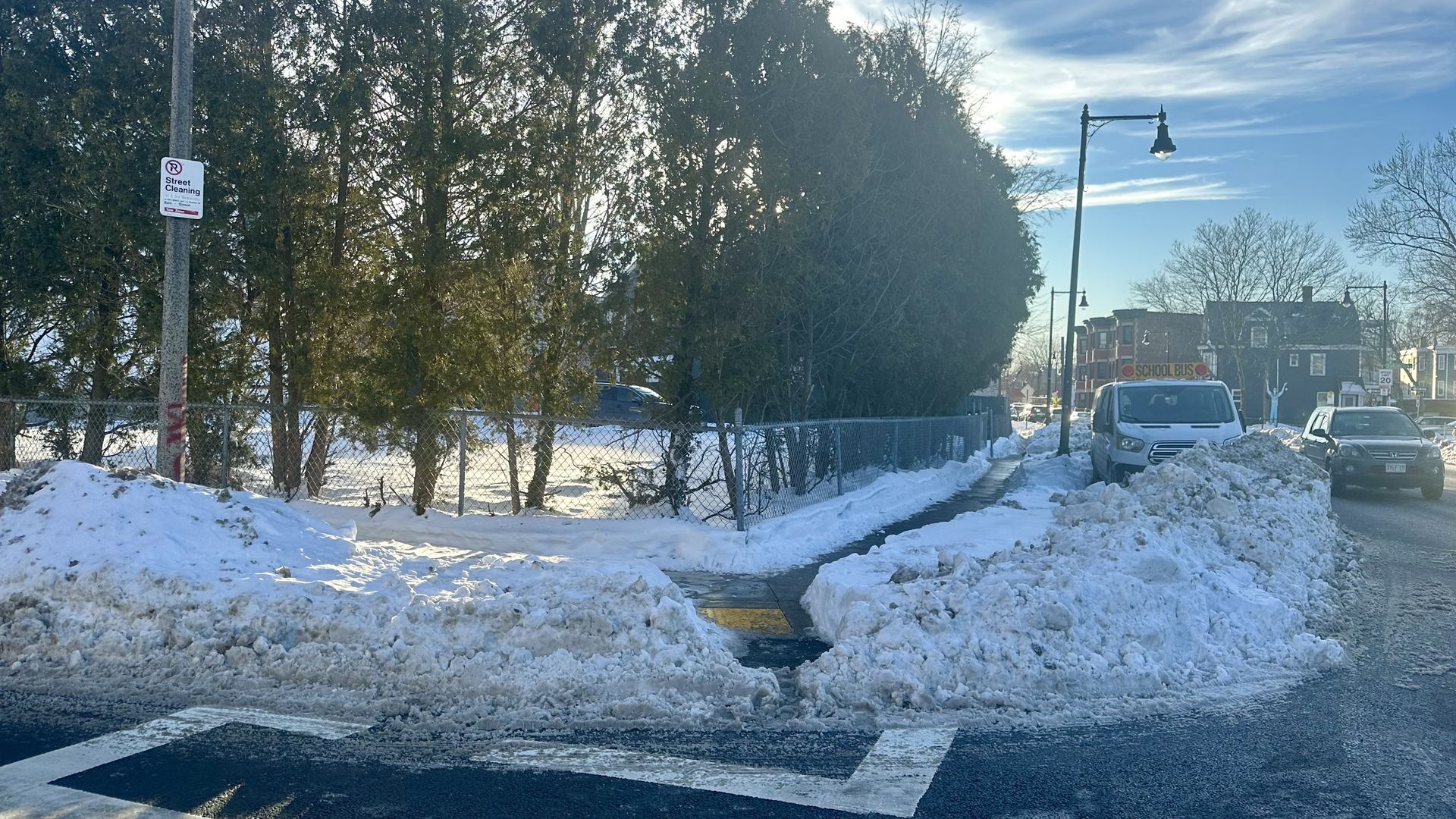 Snow piled along a sidewalk corner on the corner of Chipman and Norfolk streets in Dorchester. 