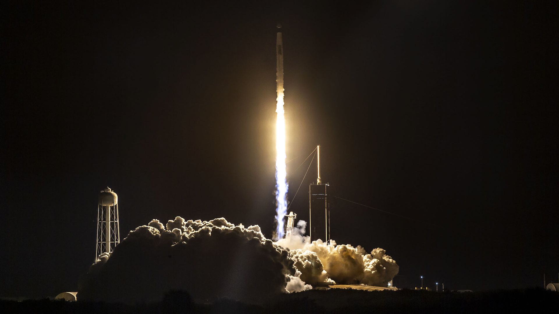 SpaceX's Falcon 9 rocket takes flight at night from Florida.
