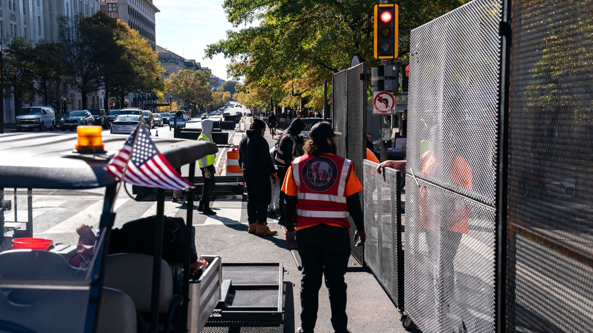 Workers erect anti-scale fencing around the White House and the Treasury Department along 15th St NW on November 03, 2024 in Washington, DC