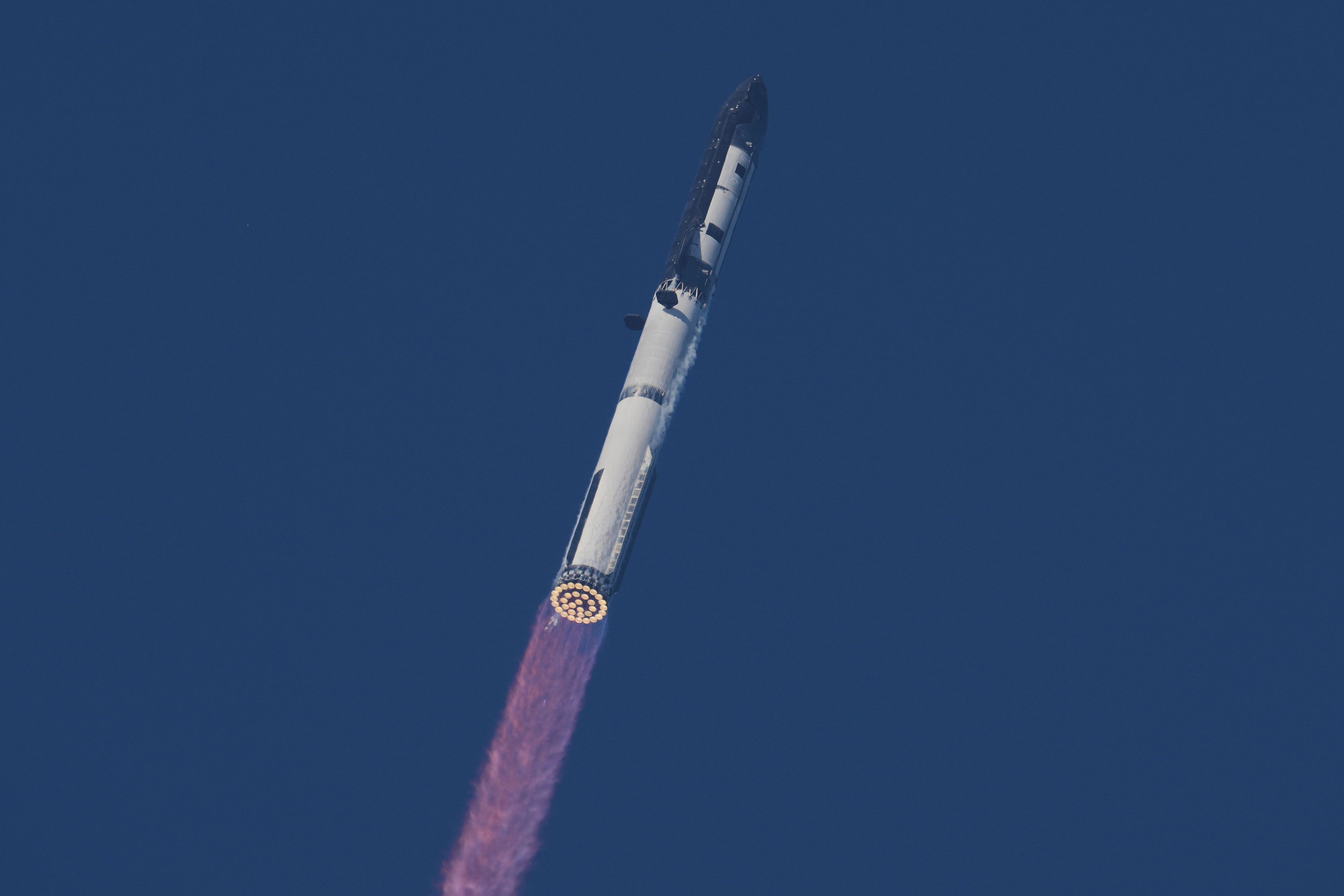 SpaceX's mega rocket Starship makes a test flight from Starbase, Texas, Friday, May 22, 2026. (AP Photo/Eric Gay)