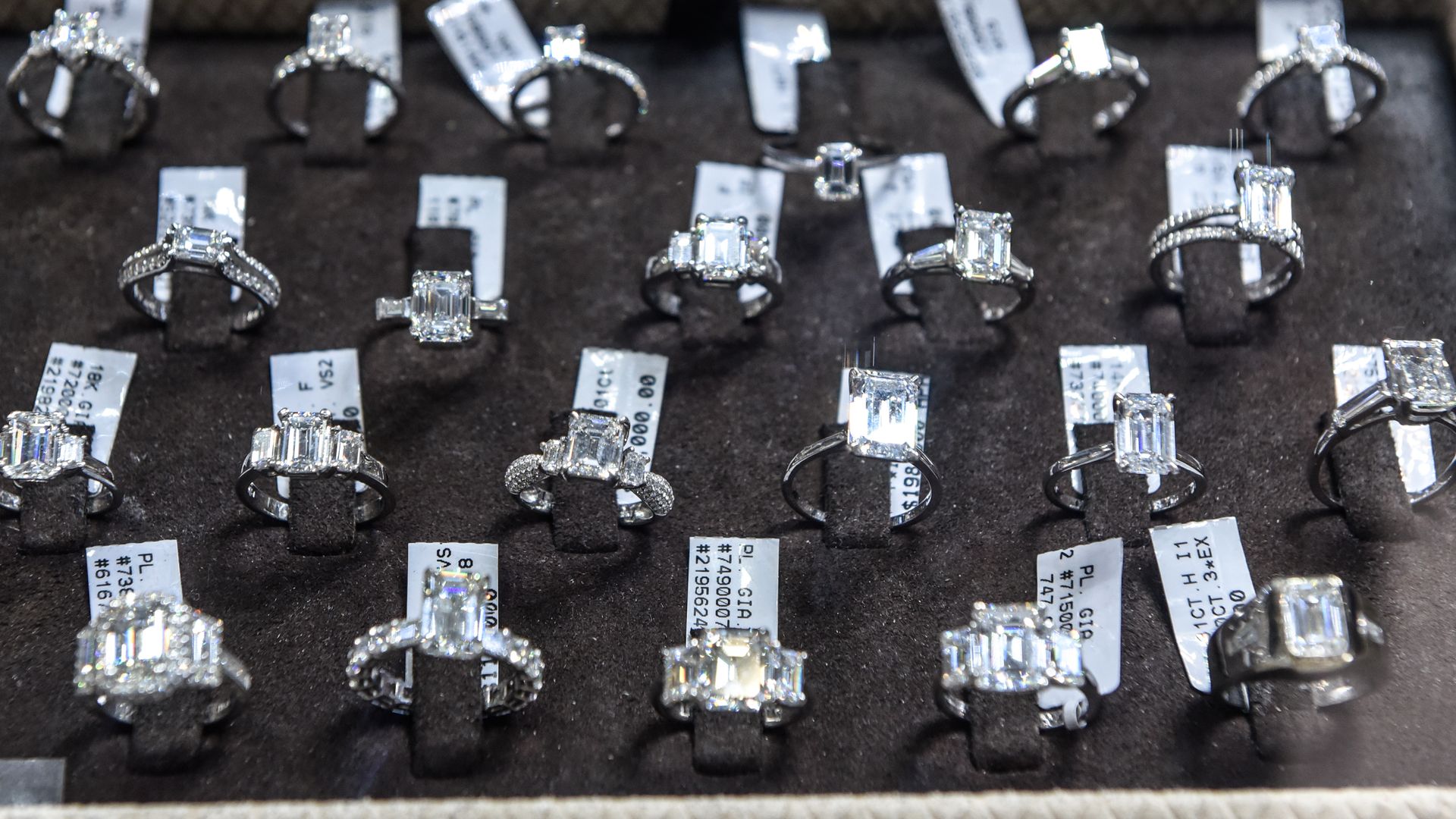 Diamond rings for sale at a store in the Diamond District neighborhood of New York, U.S., on Thursday, May 5, 2022. Russia's invasion of Ukraine is fracturing a billion-dollar trade that spans the permafrost-laden diamond mines of Siberia, secretive trade houses in Antwerp, dusty polishing powerhous