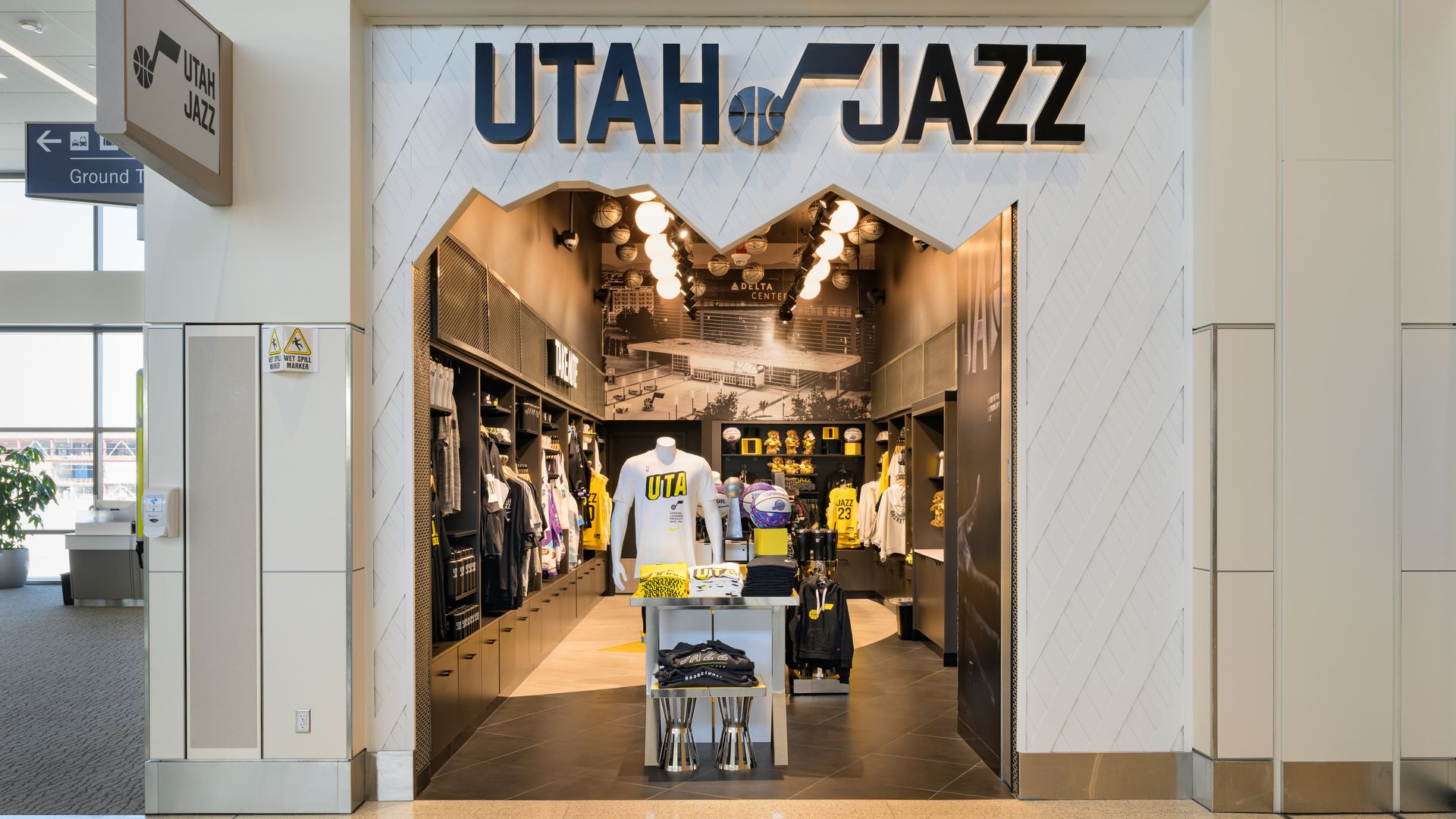 A storefront for Utah Jazz merchandise at the airport.