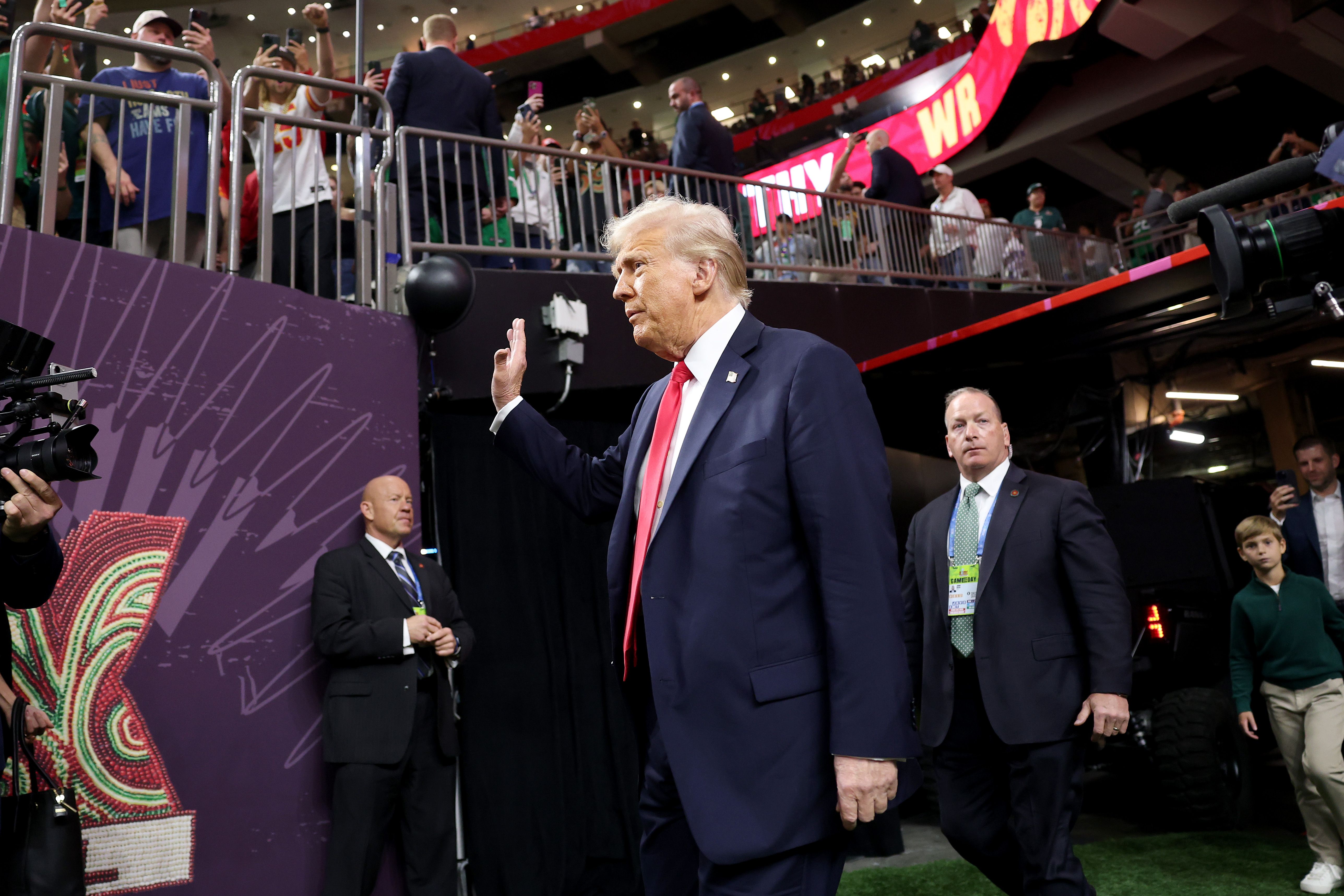 Photo shows Donald Trump on the field