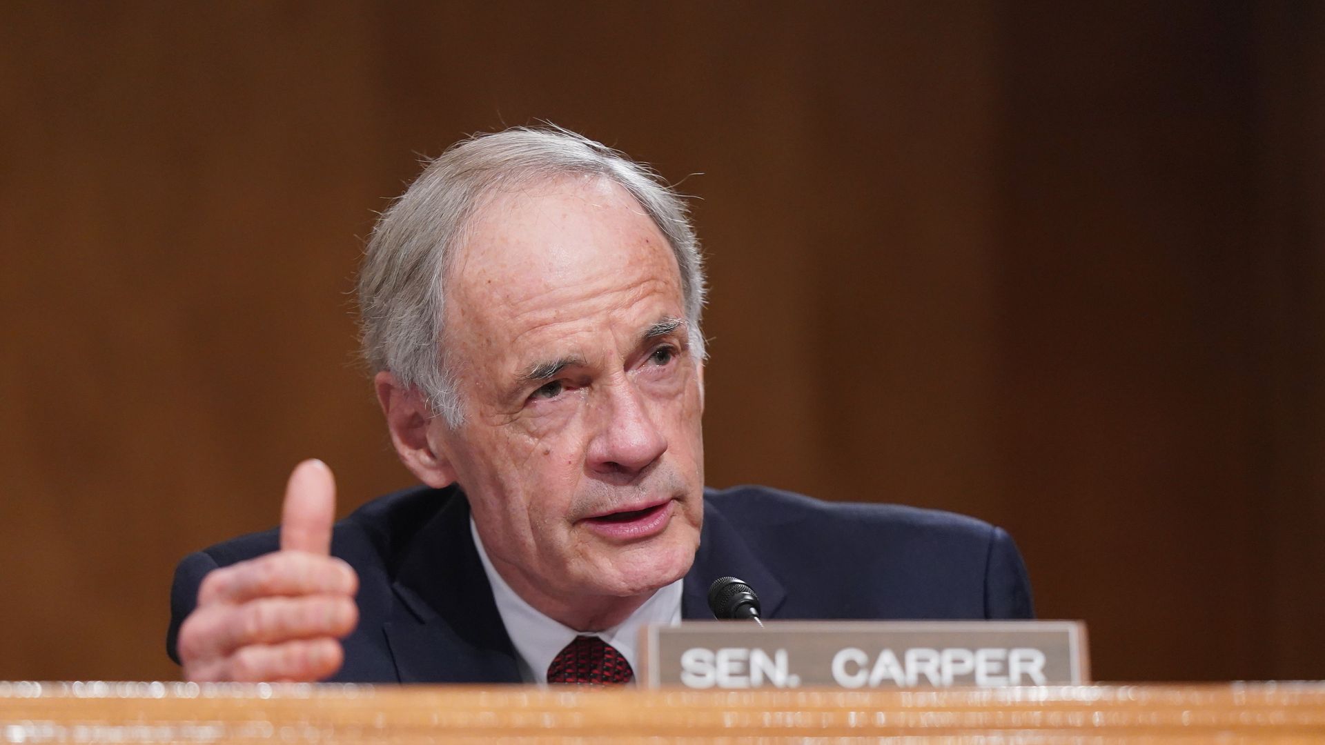 Sen. Tom Carper is seen speaking during a congressional hearing.