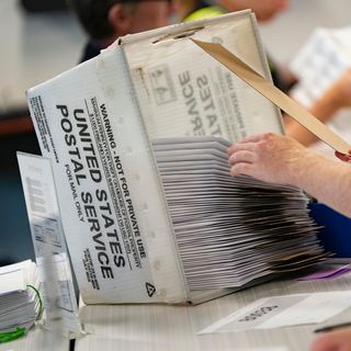 Trump's USPS mail-ballot rules hit a second roadblock as Supreme Court weighs case