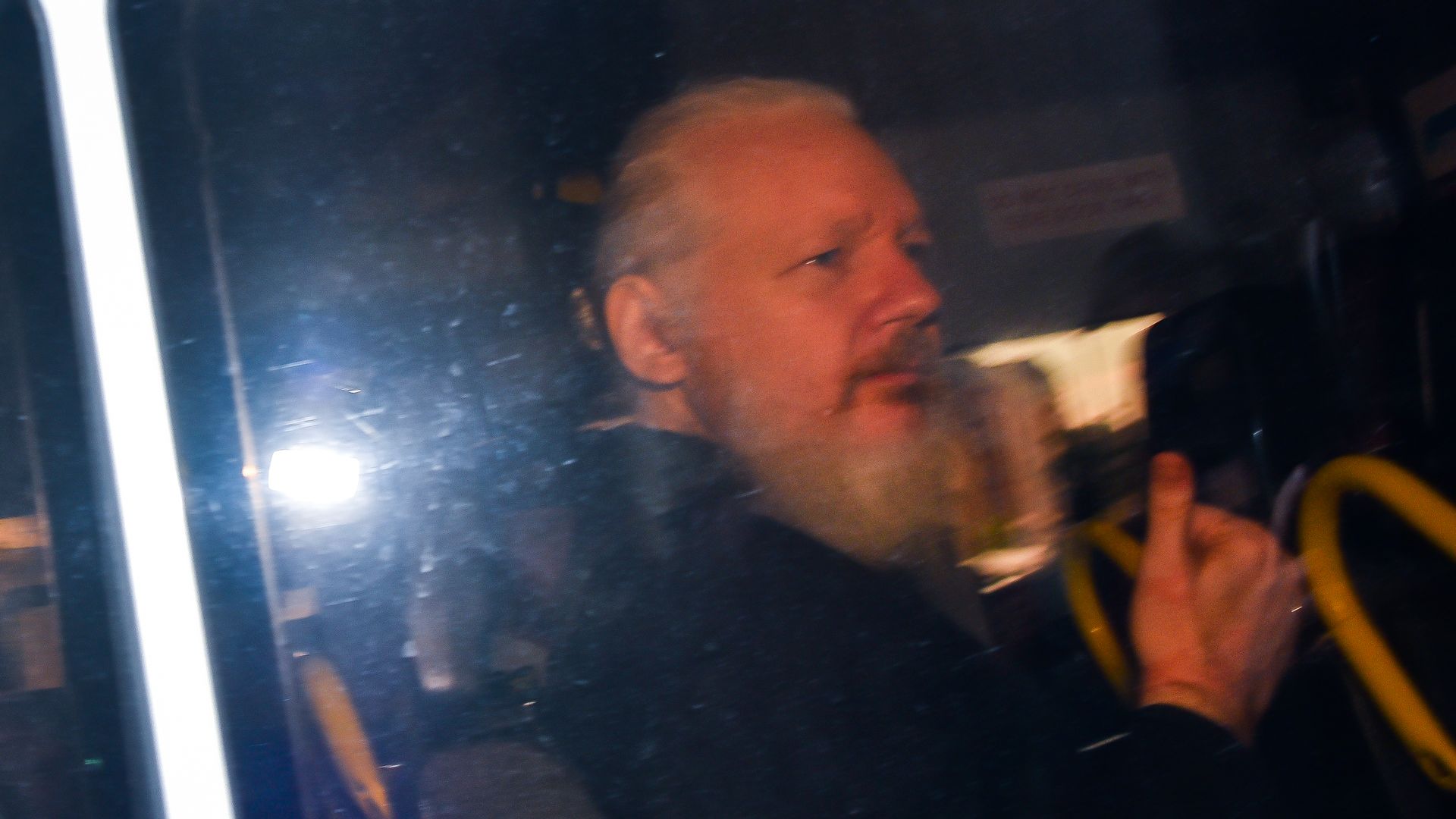  Wikileaks founder Julian Assange makes his way into the Westminster Magistrates Court after being arrested this morning by Metropolitan Police, on behalf of US authorities, London on April 11.