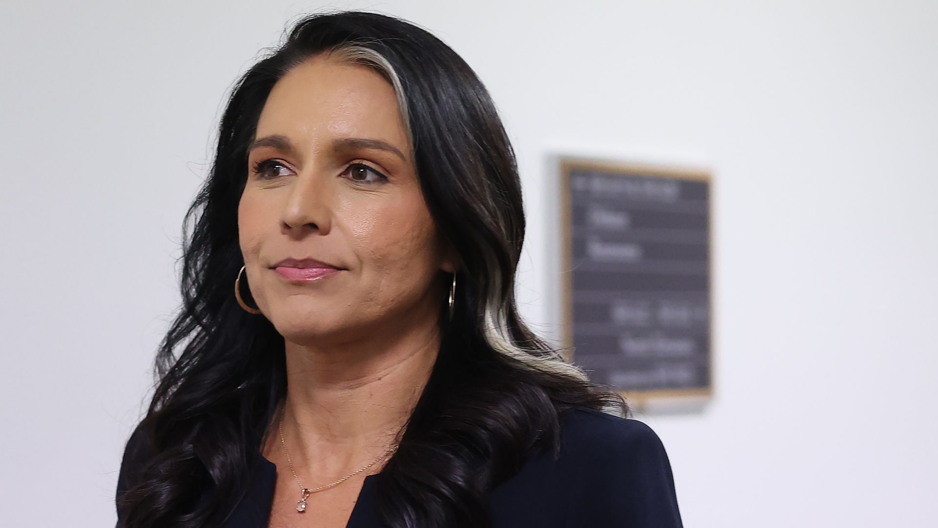 Tulsi Gabbard leaves a meeting in Hart Senate Office Building.
