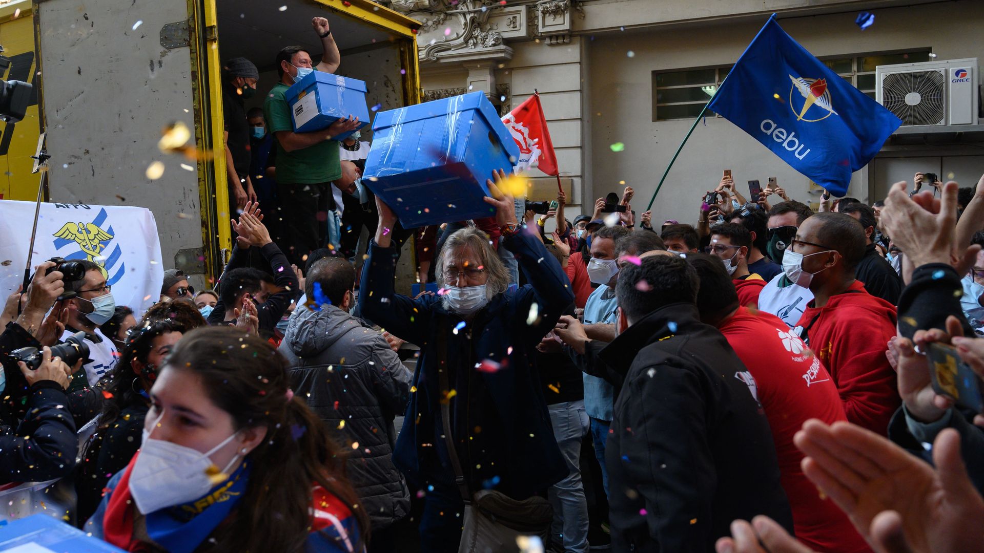Revelers celebrate in the street 