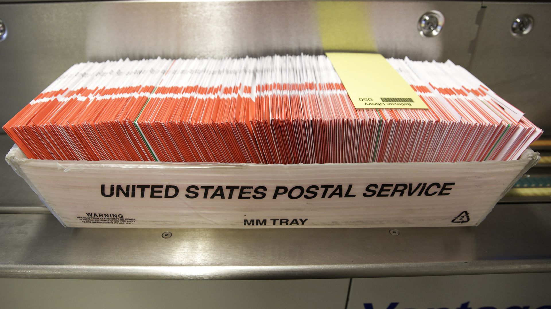 A box of ballots to be sorted are pictured in a US Postal Service box on Election Day at the King County Elections office in Renton, Washington on November 3, 2020.