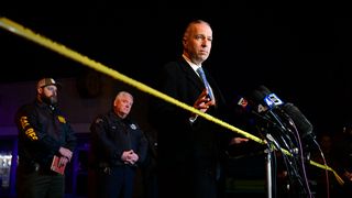 Andrew Meyer briefing the media