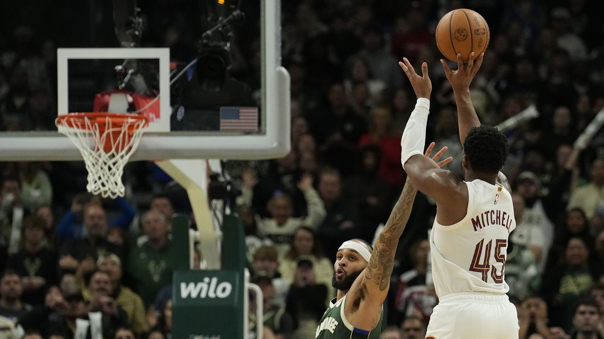 Photo of Donovan Mithcell shooting a jump shot from the back