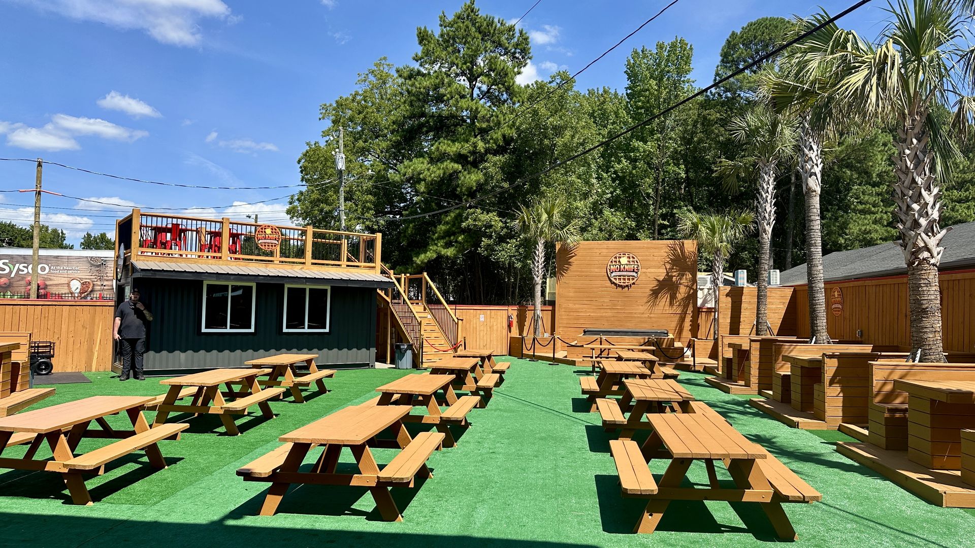 The patio of DaBaby's restaurant No Knife Chicken & Waffles