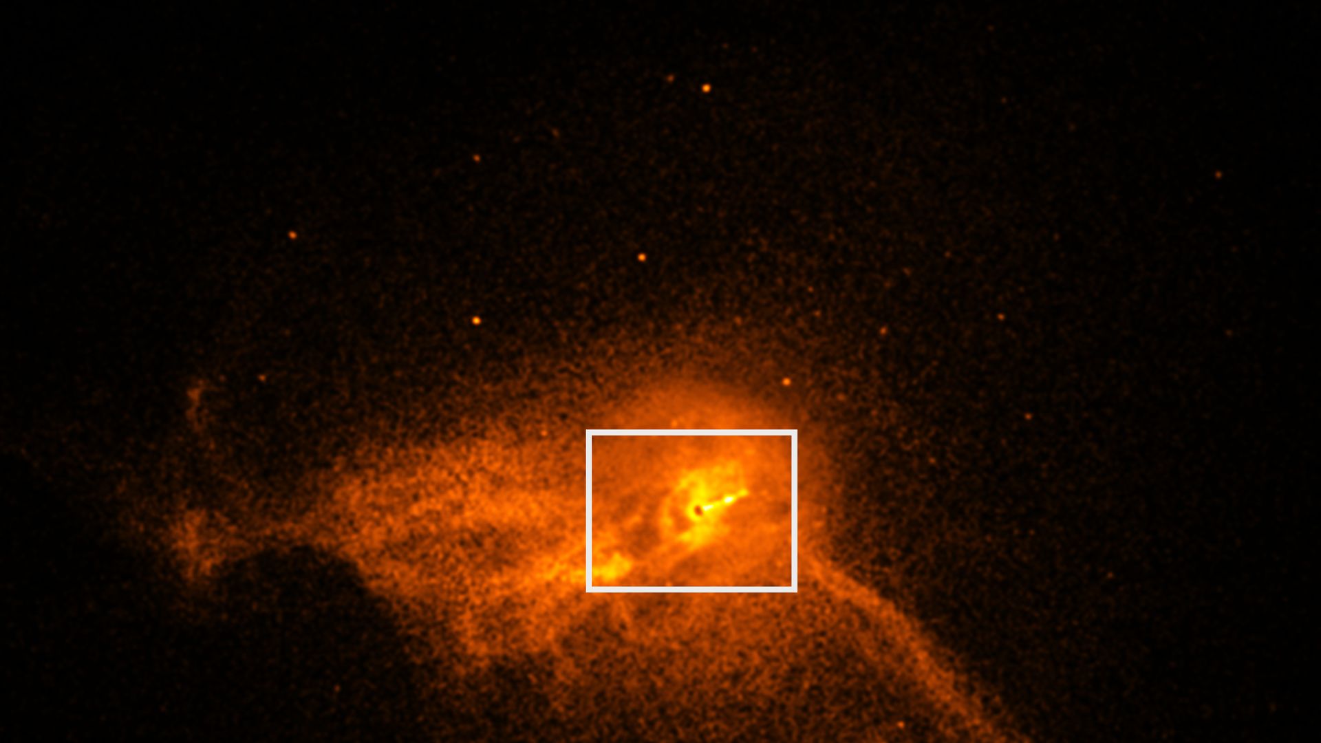 A close-up of the core of the M87 galaxy with a black hole in its center. 
