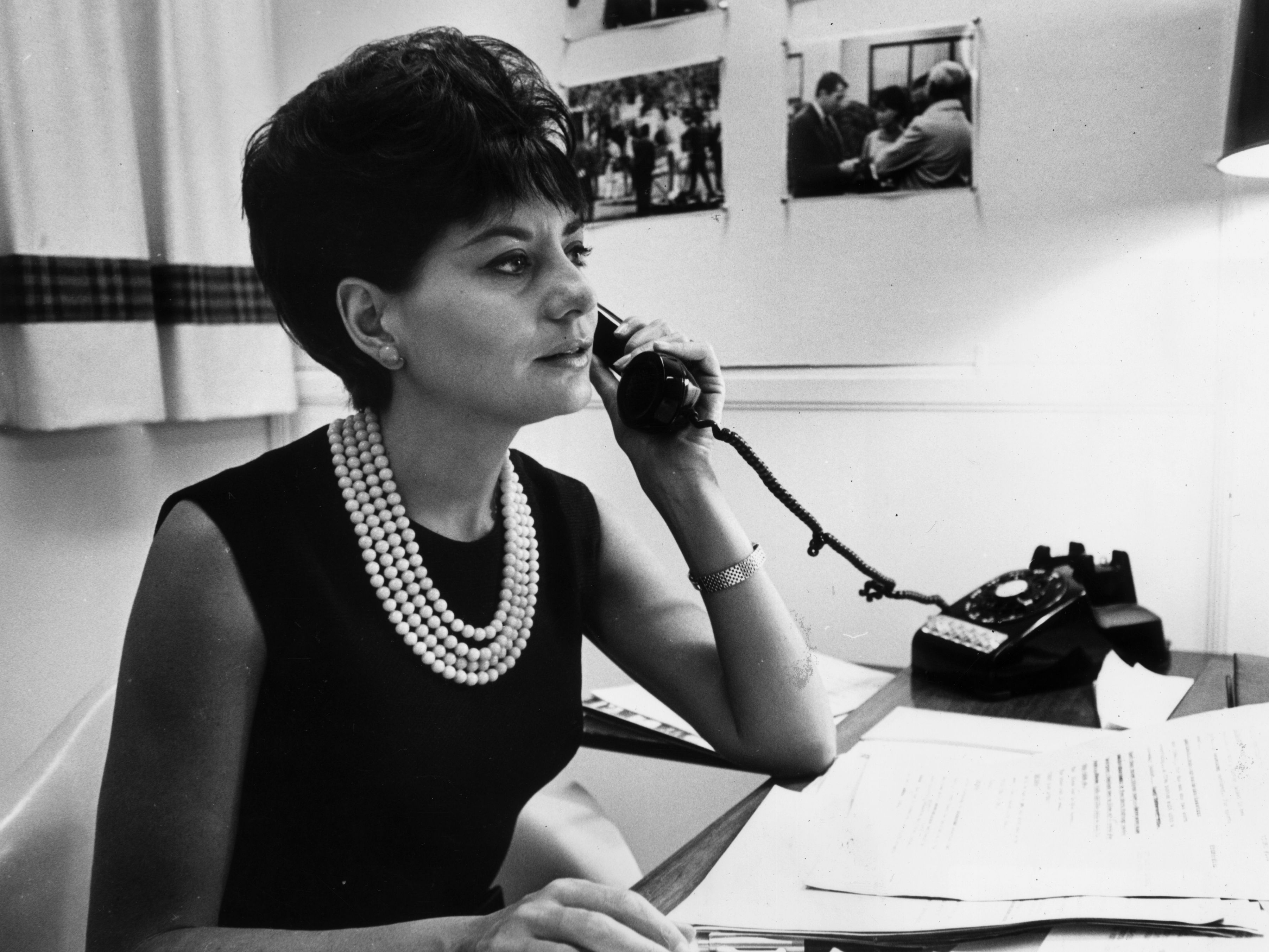 Television journalist for NBC Barbara Walters takes a phone call at her desk, New York City.
