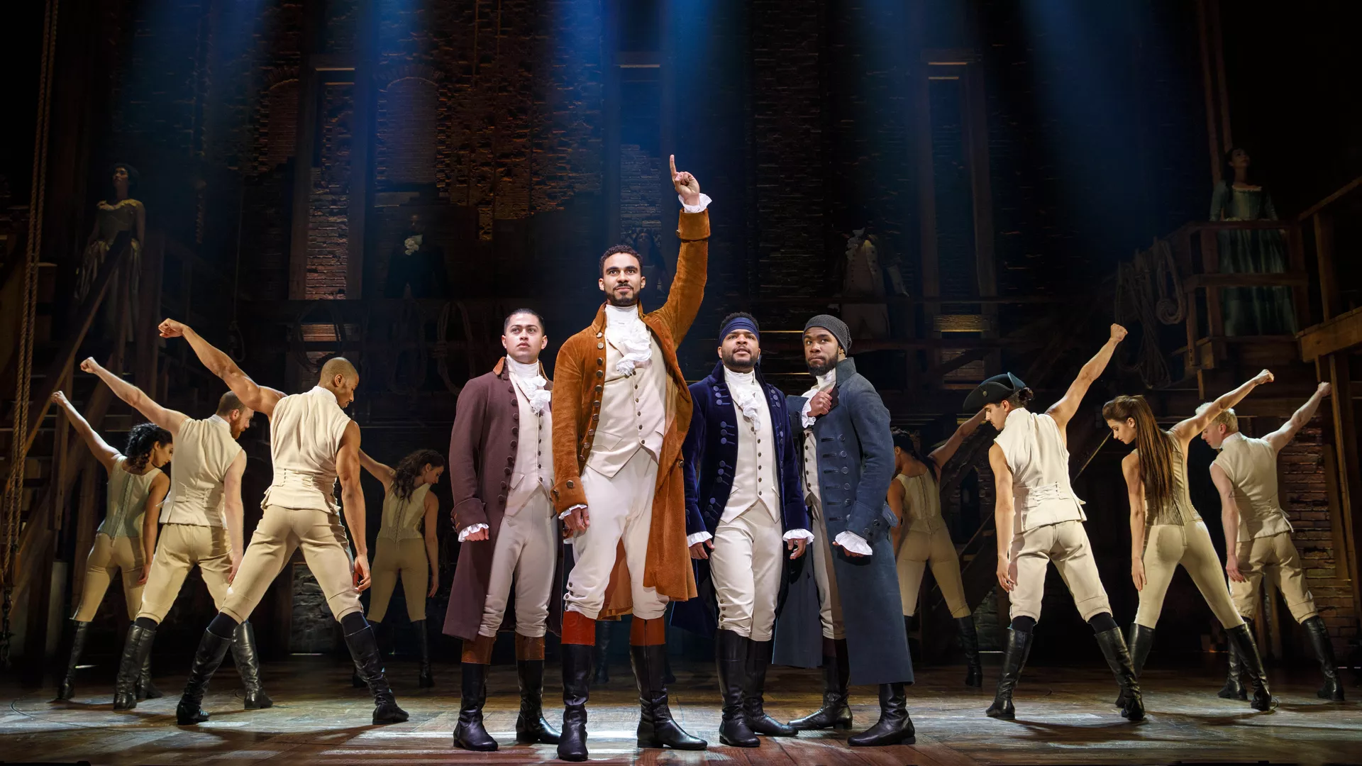 Performers in "Hamilton" on stage