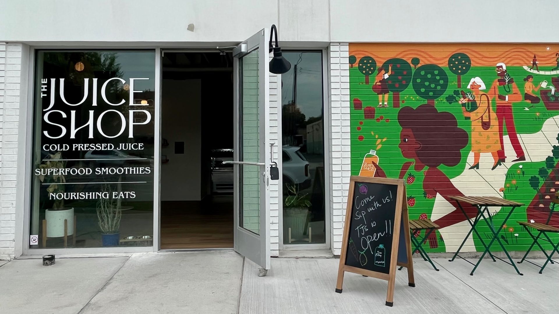 A store front of a new juice shop.