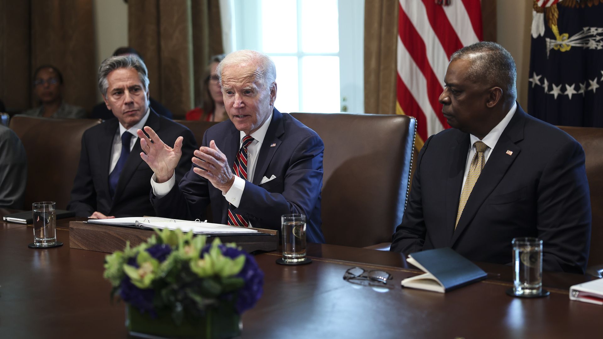Biden was seated next to Secretary of State Antony Blinken (L) and Defense Secretary Lloyd Austin