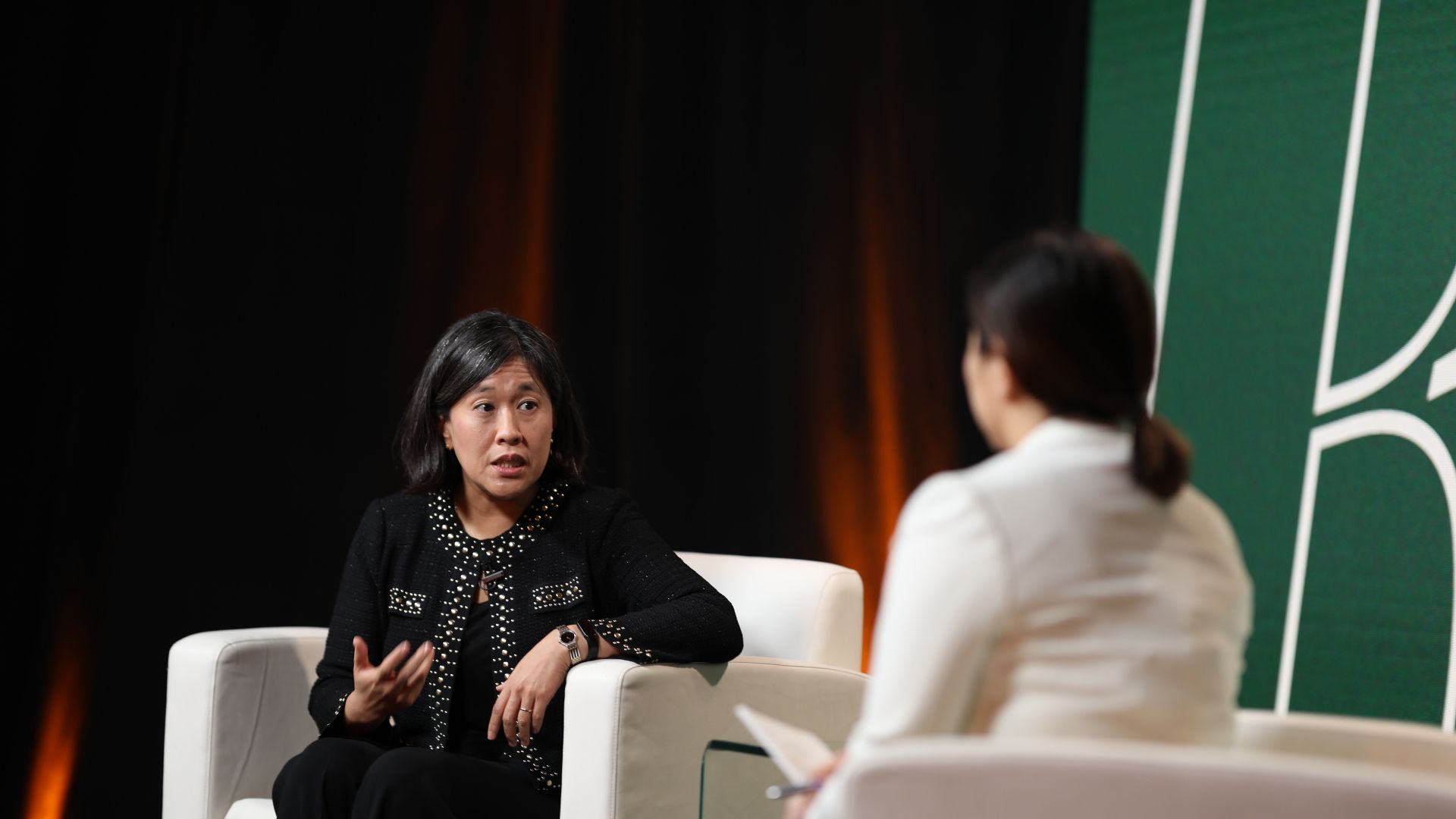 Catherine Tai and Hope King on stage at Axios' BFD