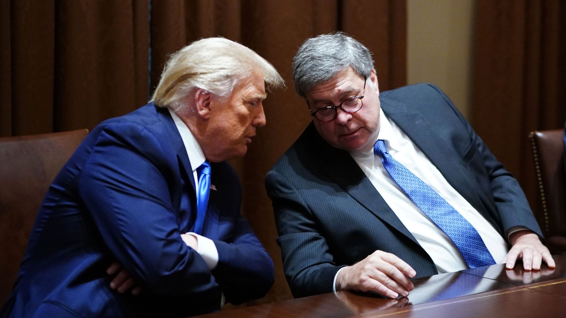 Picture of Donald Trump whispering to Attorney General William Barr.