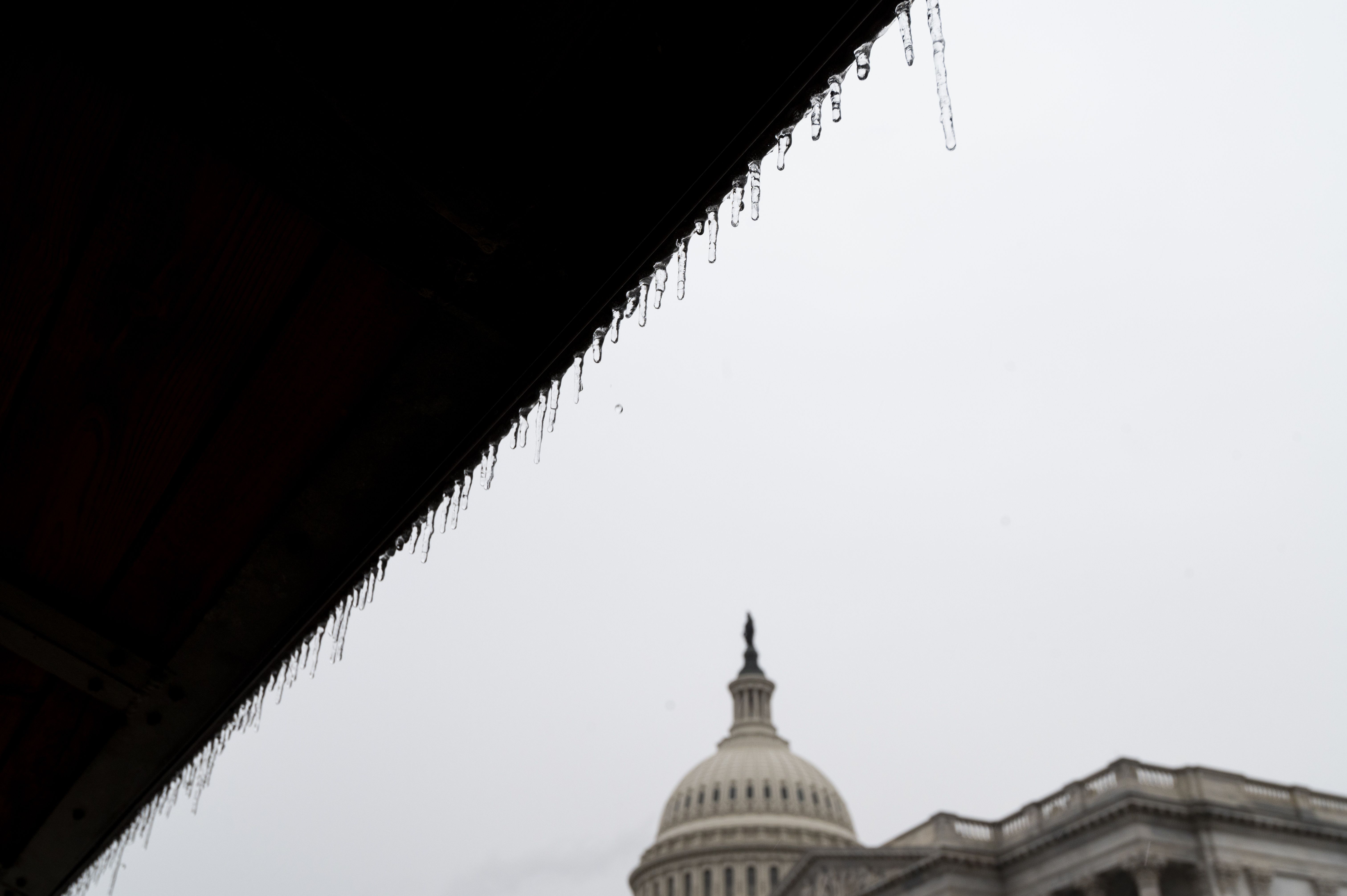 Icicles form outside the Capitol during the impeachment trial in the Senate as sleet and freezing rain fall in Washington on Saturday, Feb. 13