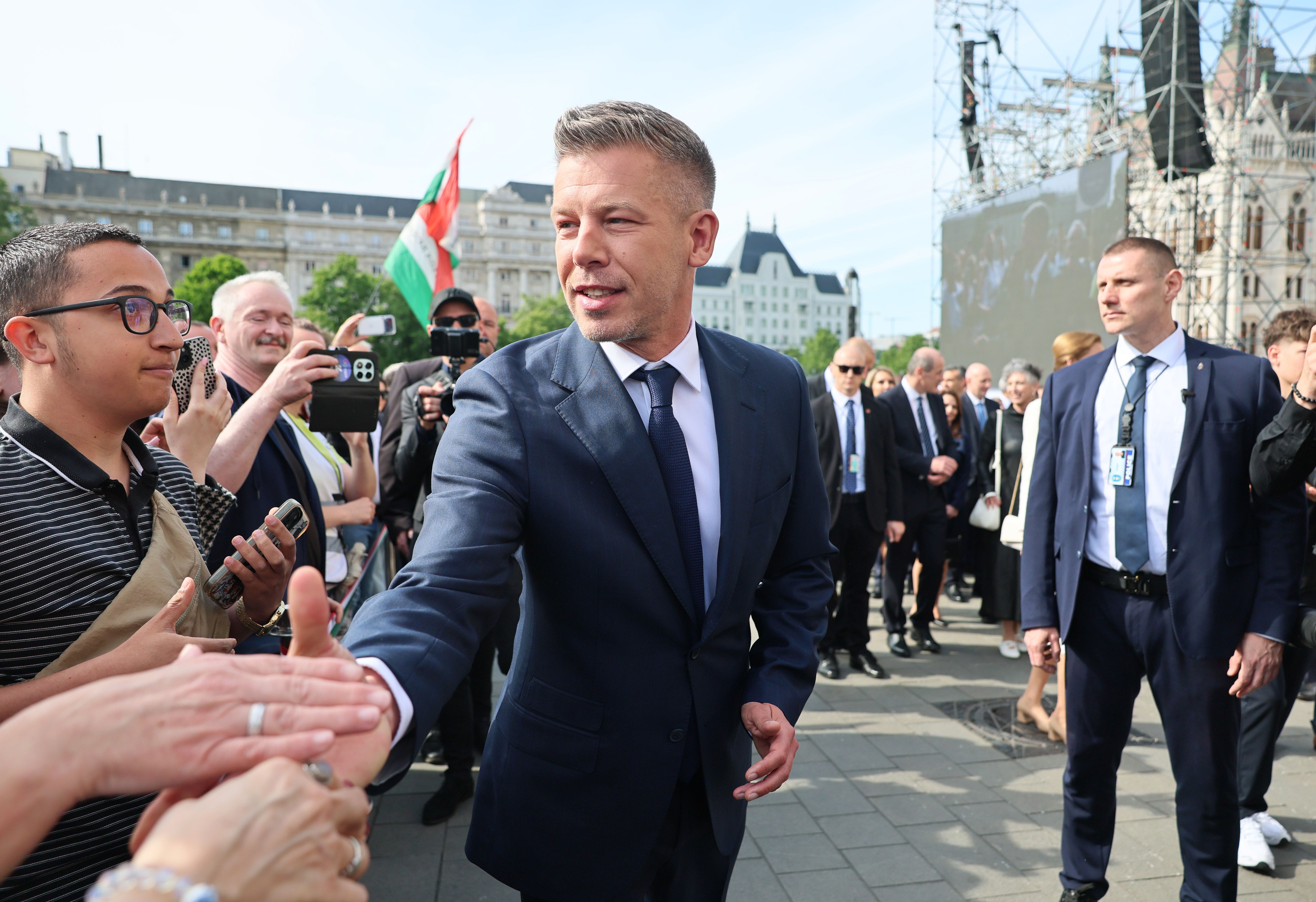 BUDAPEST, HUNGARY - MAY 09: Incoming Prime Minister Peter Magyar greets supporters outside of Hungarian Parliament on the day Tisza Party leader Peter Magyar is sworn in as prime minister on May 09, 2026 in Budapest, Hungary. The victory of Magyar's Tisza Party in last month's parliamentary election