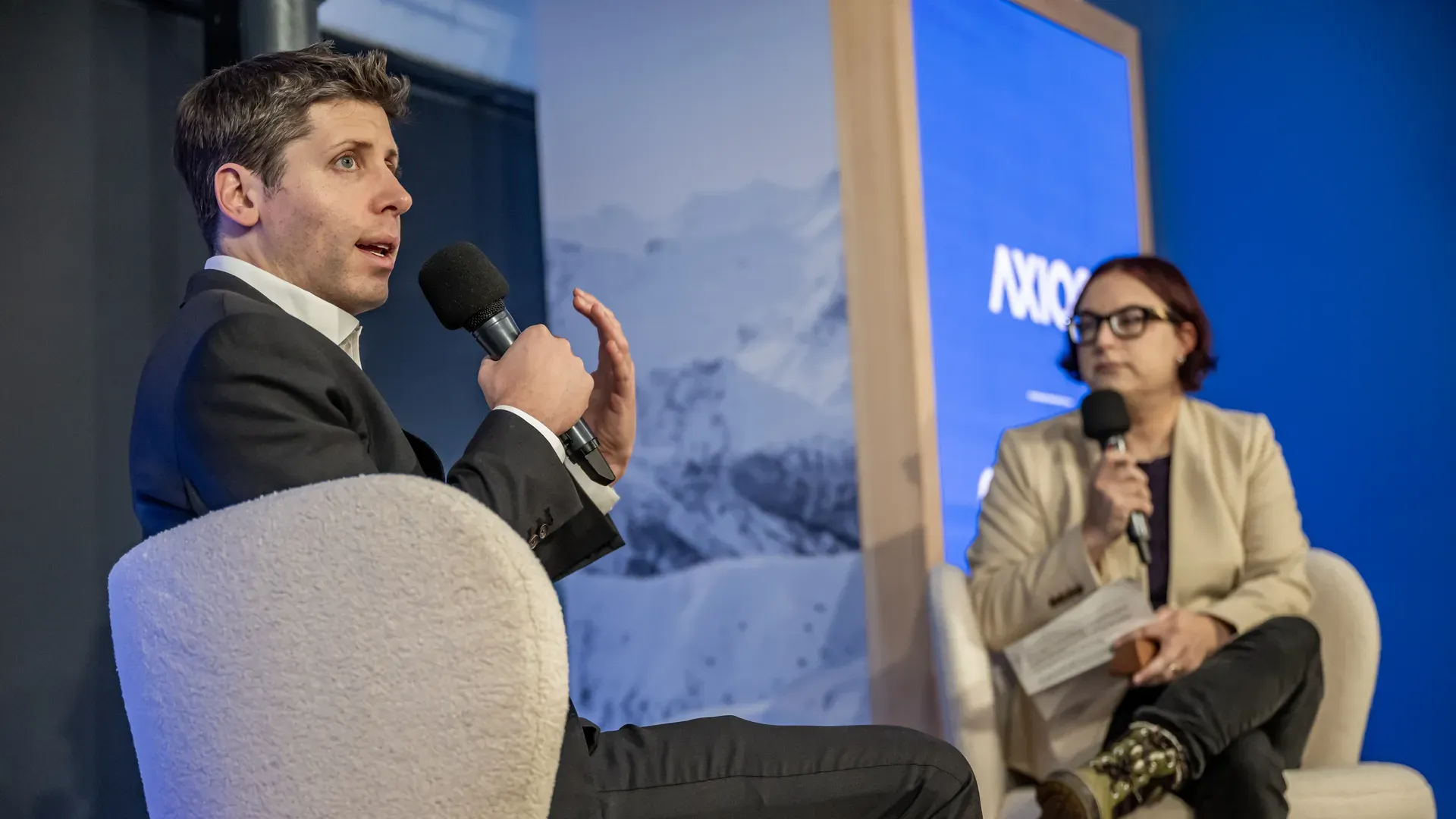 Sam Altman and Ina Fried on stage at Davos