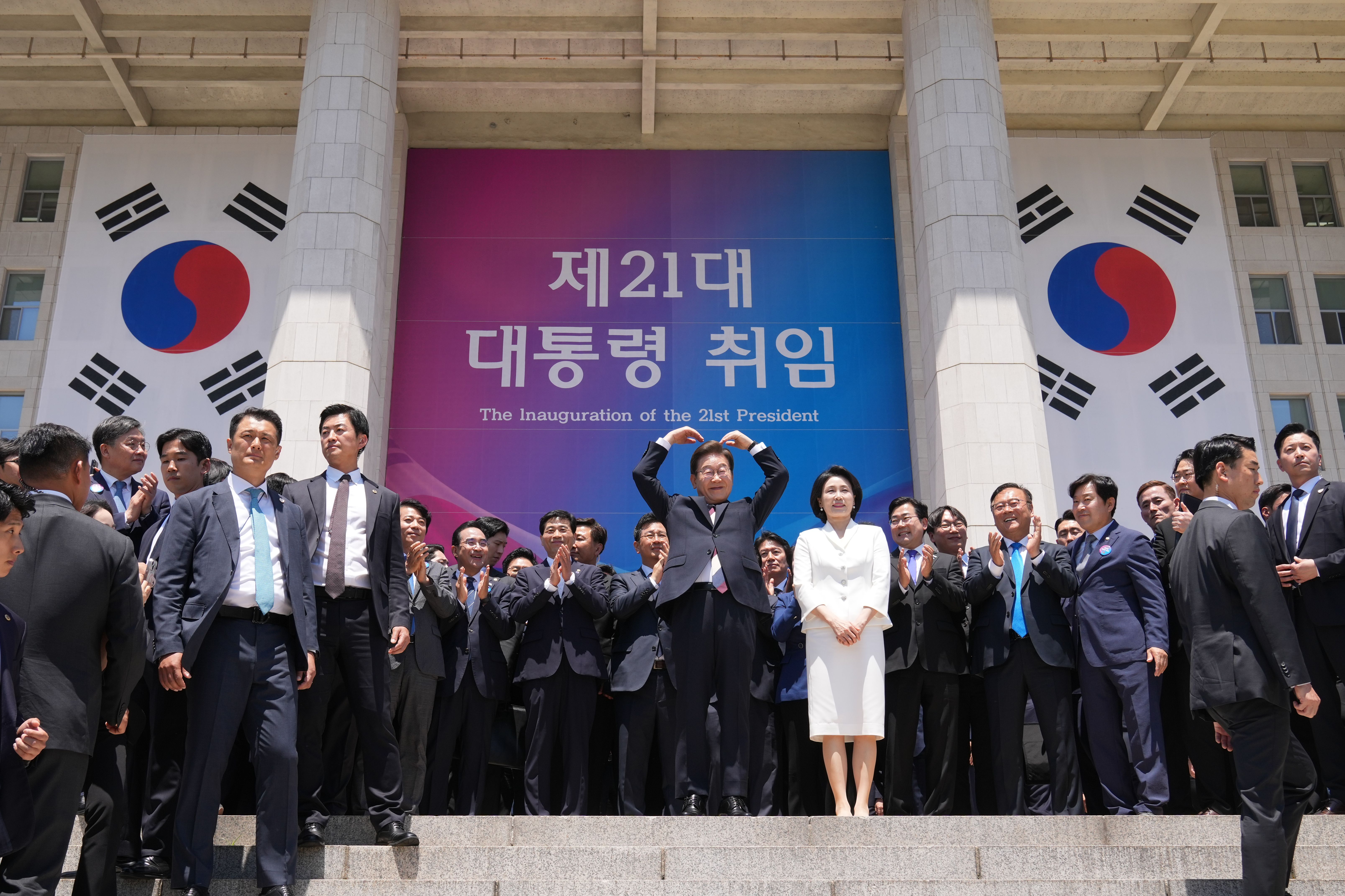 Newly elected South Korean President Lee Jae-myung, and his wife Kim Hea Kyung, react after the Presidential Inauguration at the National Assembly on June 04, 2025 in Seoul, South Korea. Lee began his five-year term without a transition period earlier in the day as he won a snap election following t