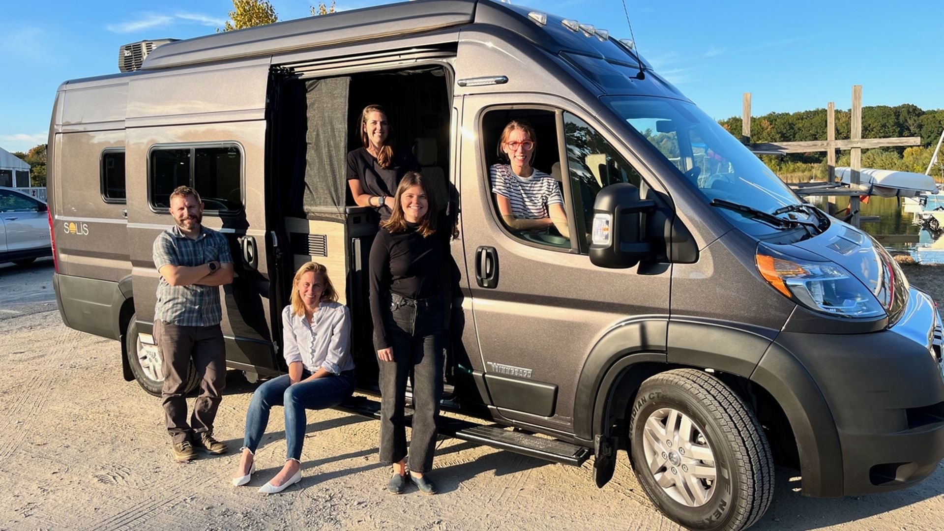 A van with the employees of a Maine-based advertising agency.