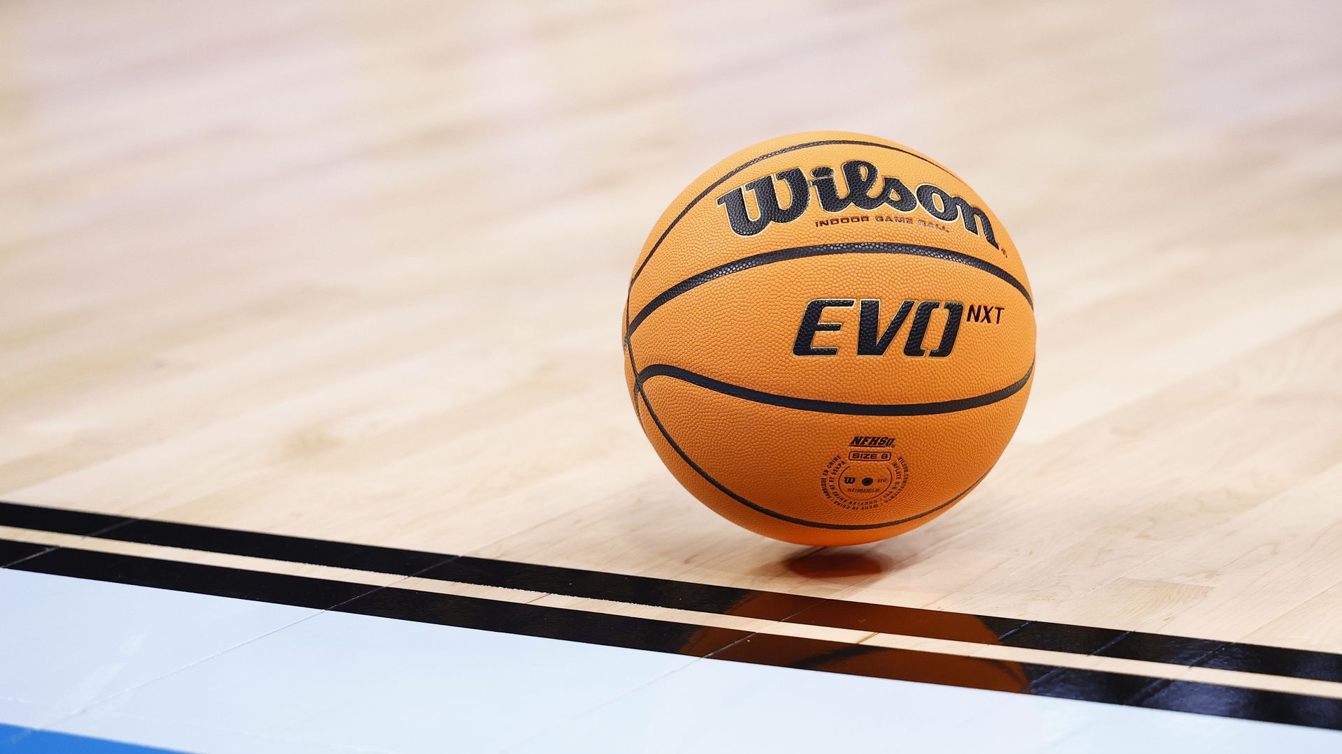 Photo of a basketball on a court