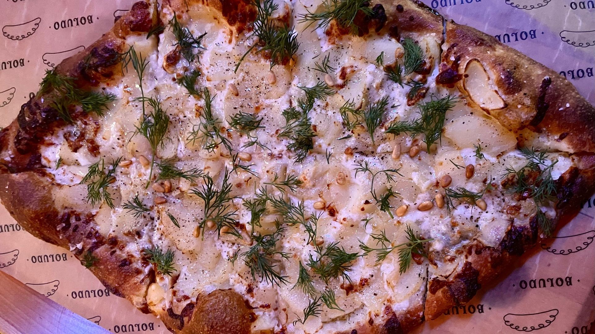 A photo of Boludo's diamond-shaped pizza.