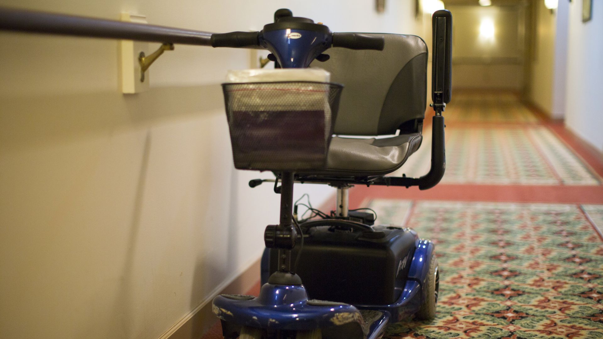 An electric scooter in a nursing home.