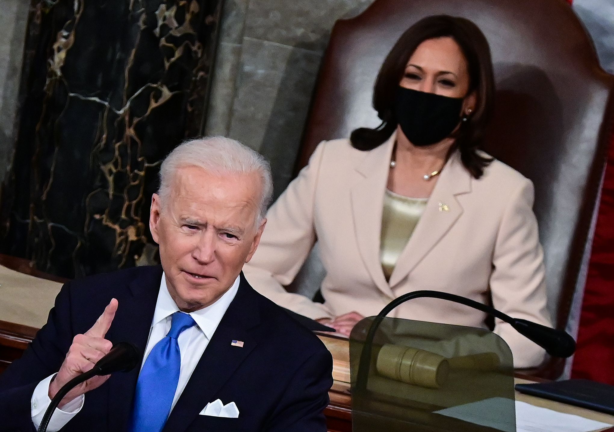 President Joe Biden addresses a joint session of congress as Vice President Kamala Harris looks on in the House chamber of the U.S. Capitol on April 28, 2021 in Washington, DC.
