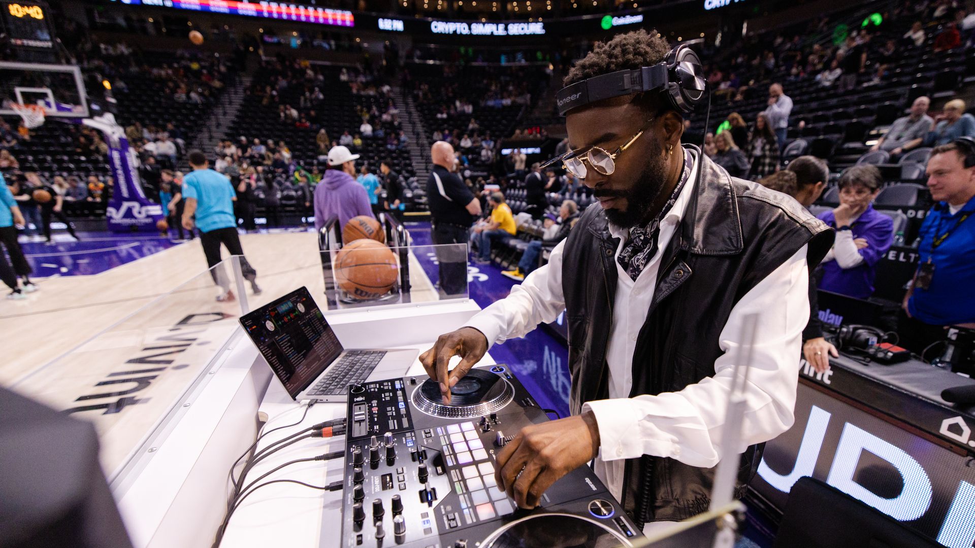 DJ Joune selects music at Utah Jazz game. Photo: Courtesy of the Jazz