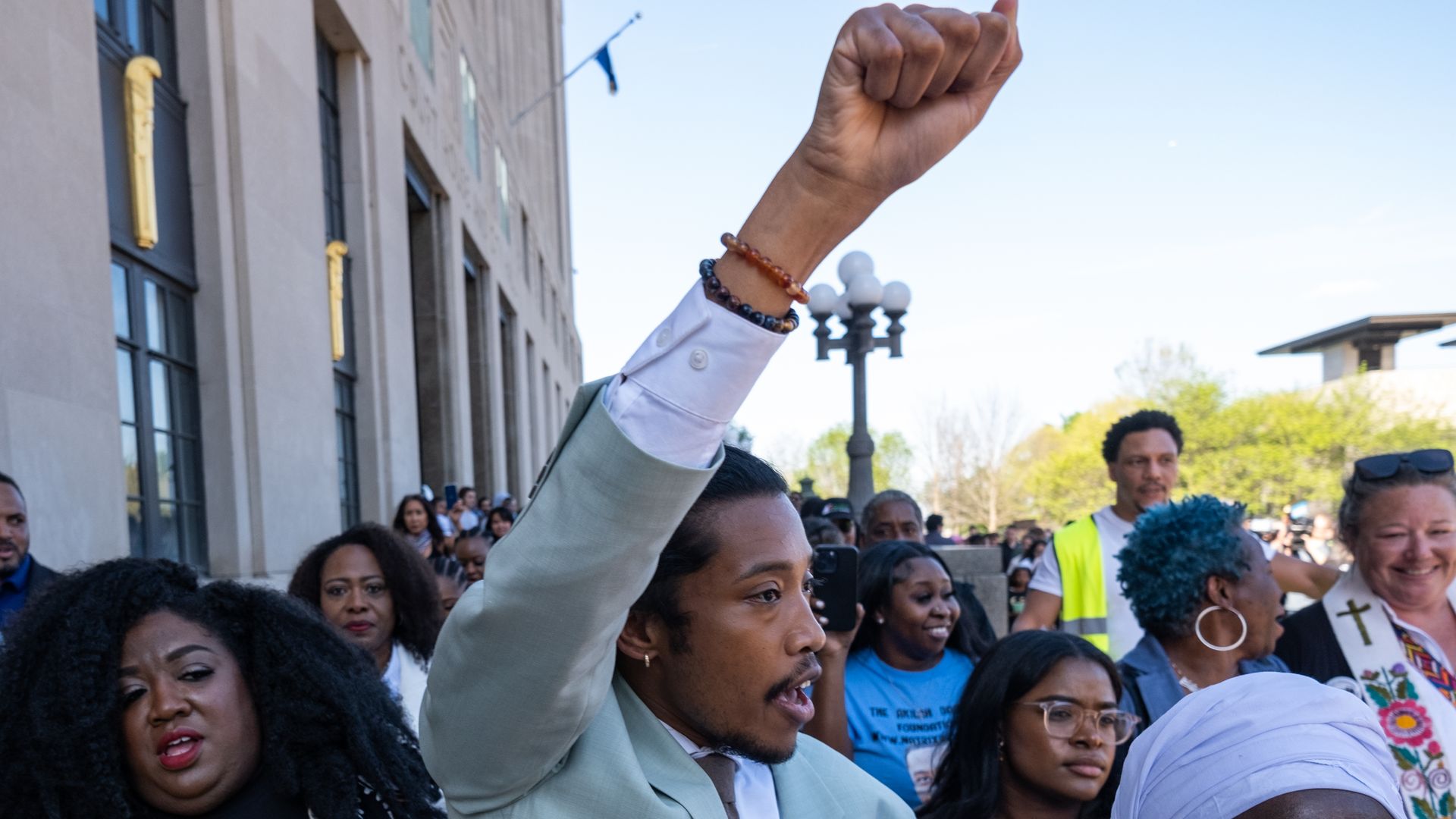 State Rep. Justin Jones of Nashville raises his fist after being reinstated to his seat on April 10, 2023 in Nashville, Tennessee. 