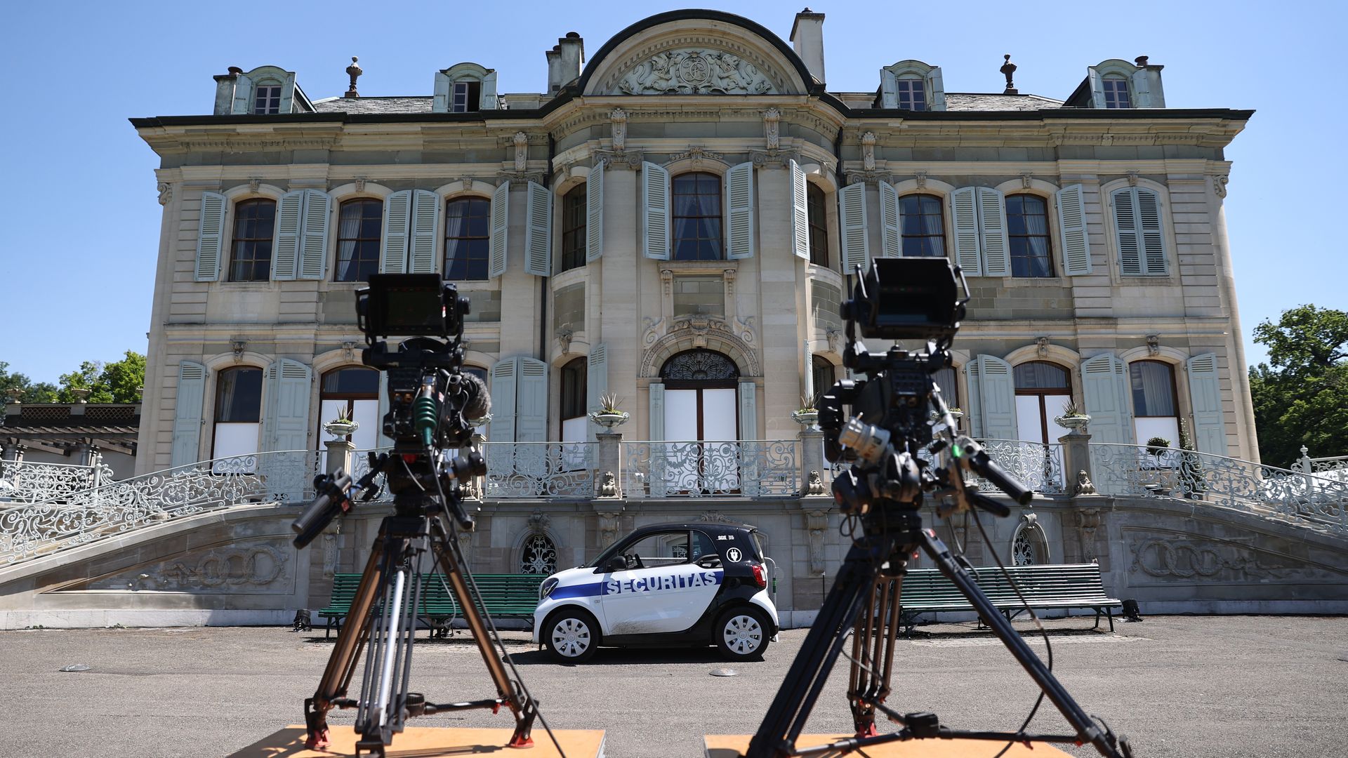 Television cameras are seen at the ready outside the Swiss venue for the summit between Presidents Biden and Putin.