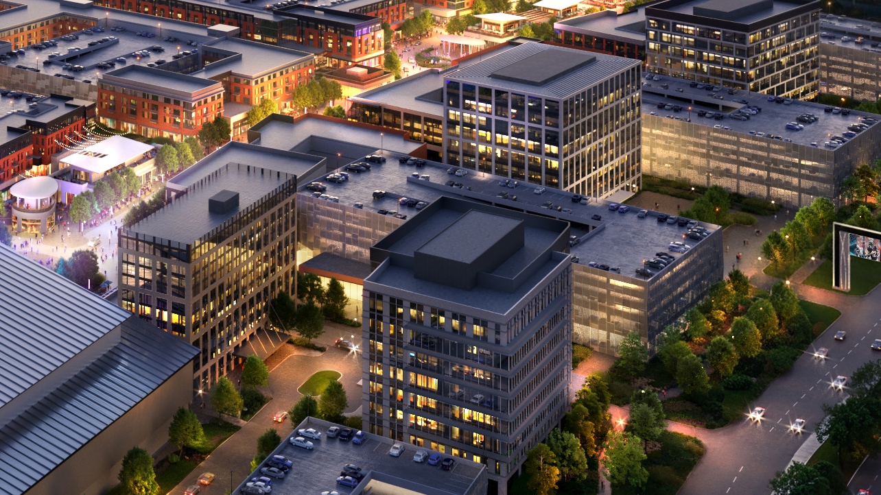 Aerial view of a modern urban complex at dusk, featuring glass office buildings with illuminated windows, rooftop parking, green trees, lit streets, and people walking in a plaza.