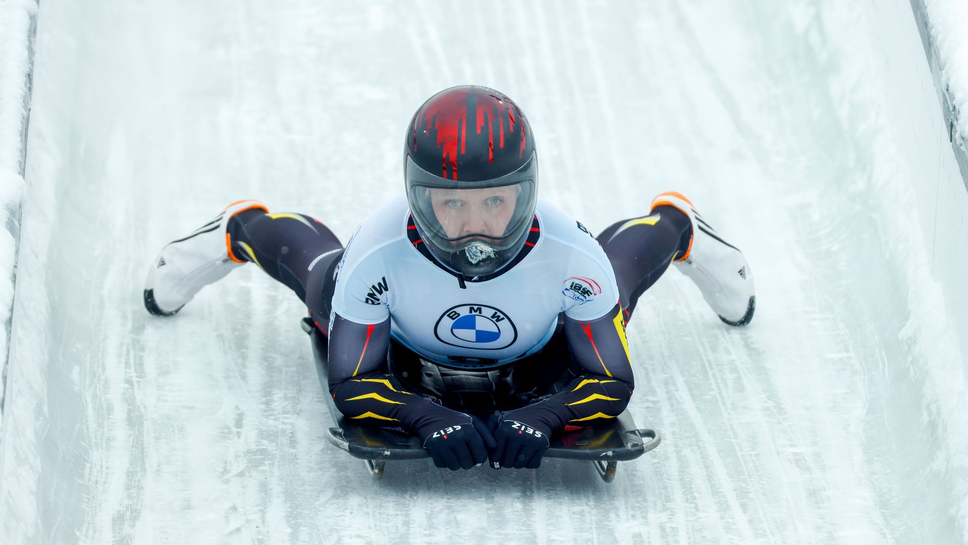 Belgium's Kim Meylemans reacts as she finishes the fourth run of the women's skeleton competition of the IBSF Skeleton World Championship in Altenberg, eastern Germany, on February 12, 2021