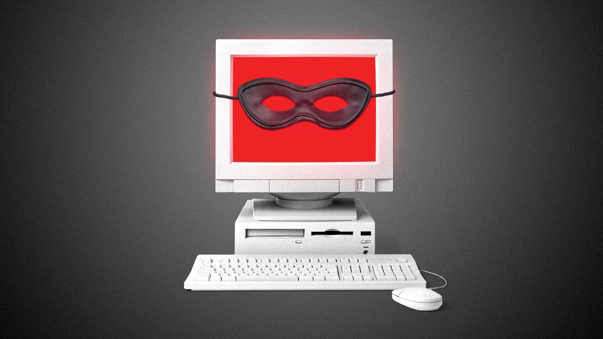 a computer with an eye mask over it