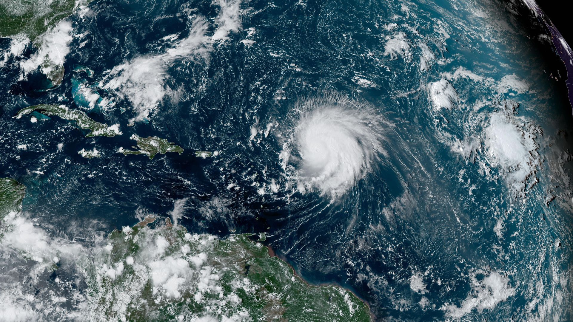 Satellite image showing a hurricane in the tropical Atlantic Ocean in 2022. 
