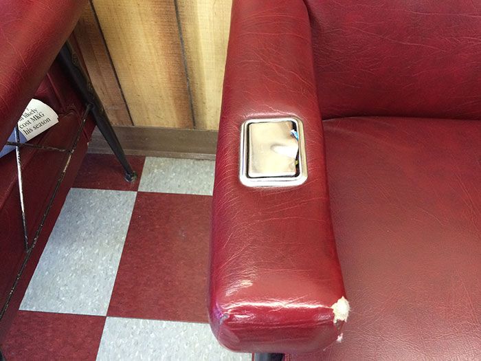 ash tray in arm of chair