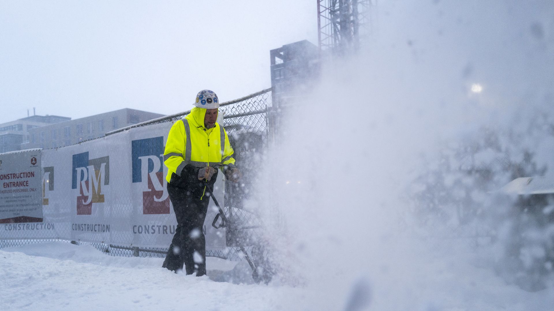 Minnesota man clears snow from massive winter storm impacting the U.S. on Feb. 23, 2023