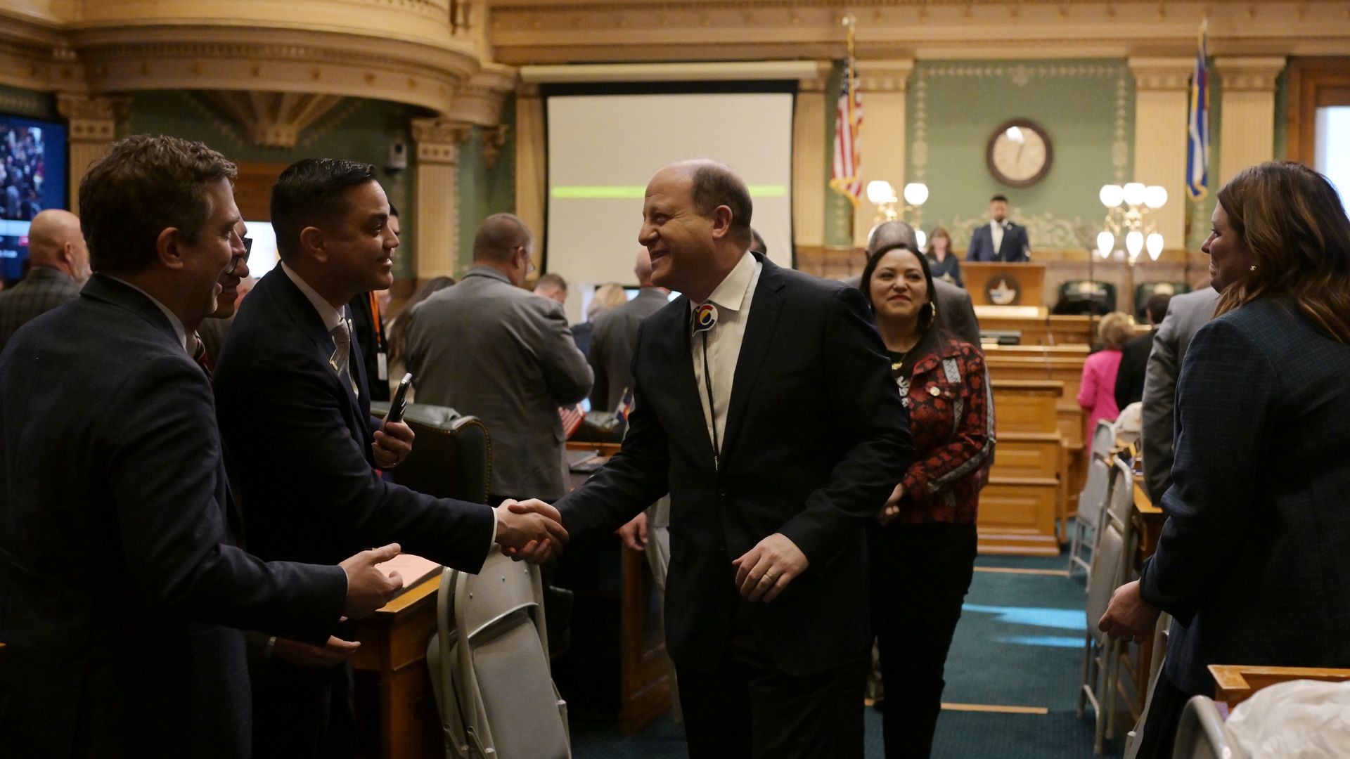 Gov. Jared Polis, center, leaves the House chamber after delivering his final State of the State address Jan. 15. Photo: Hyoung Chang/The Denver Post via Getty Images