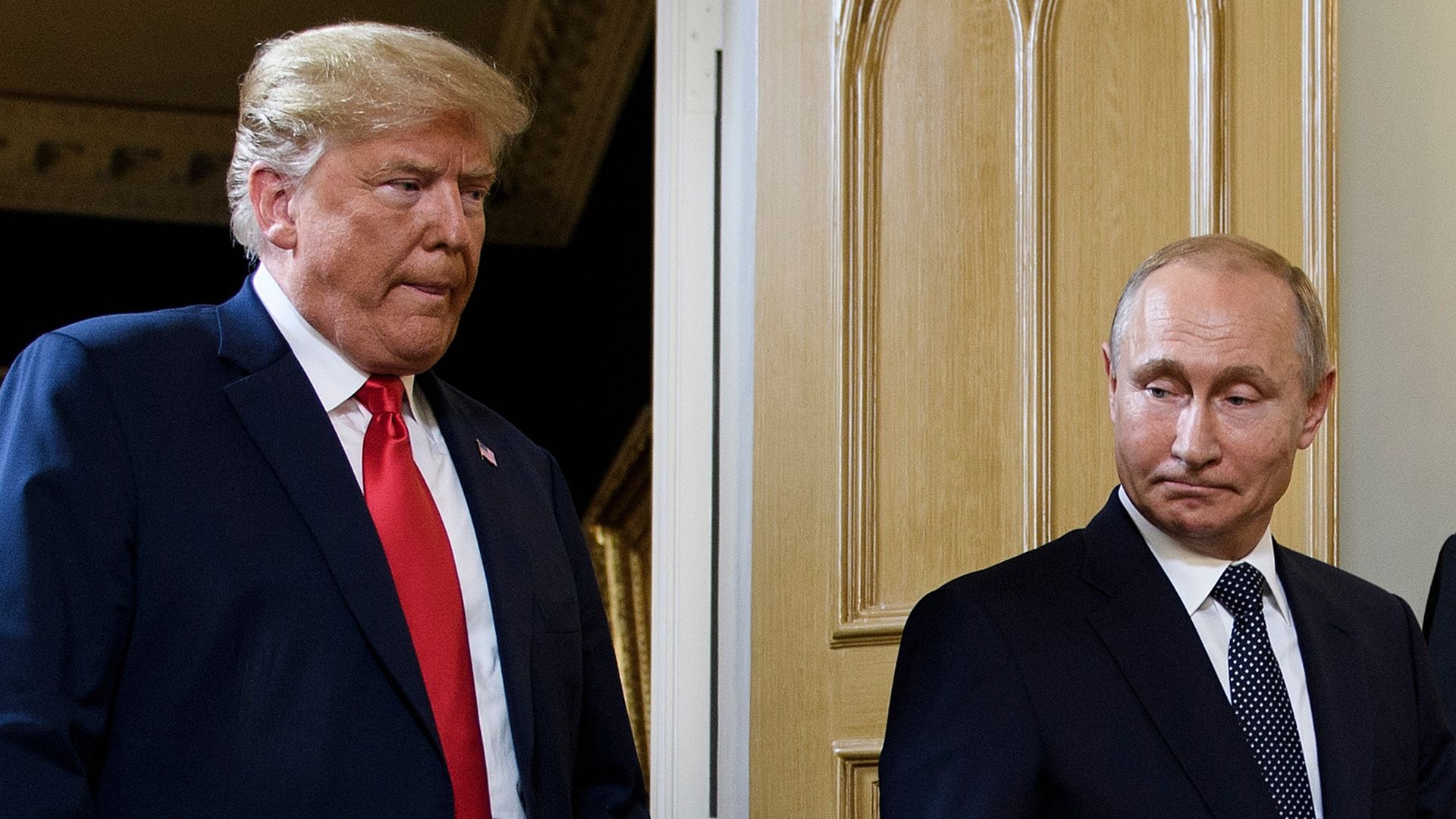 Trump and Putin standing next to each other