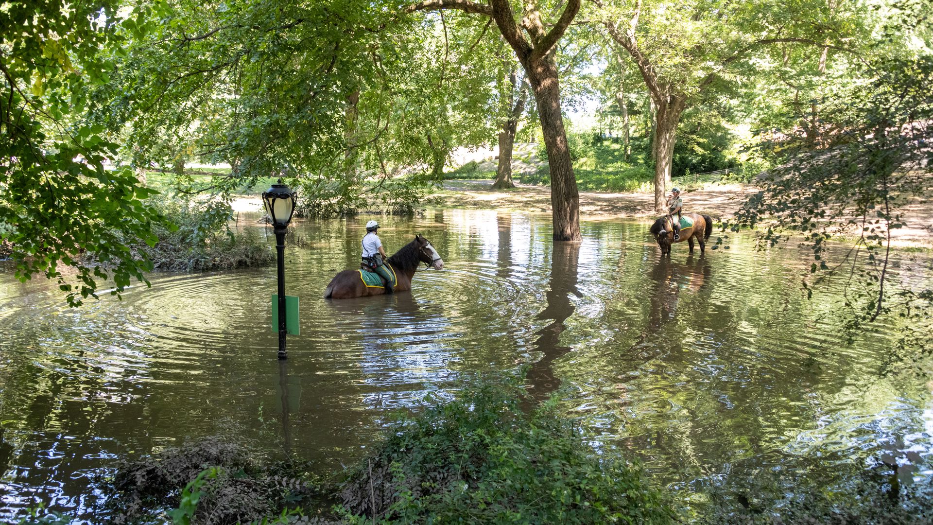 New York City Parks Security Service officers on horseback explore the Greyshot Arch 
