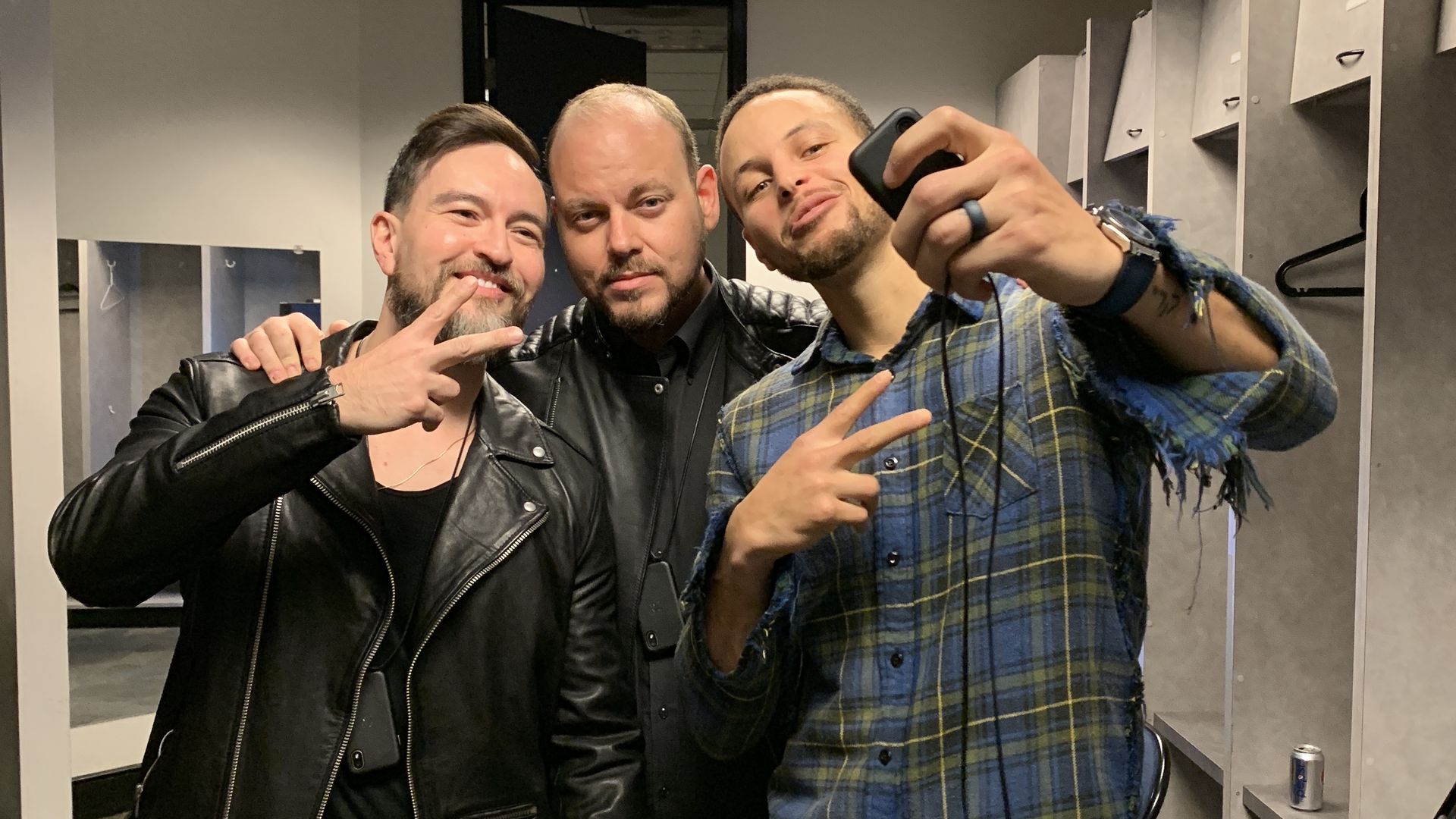 Warriors star Stephen Curry with the founders of the latest incarnation of Palm
