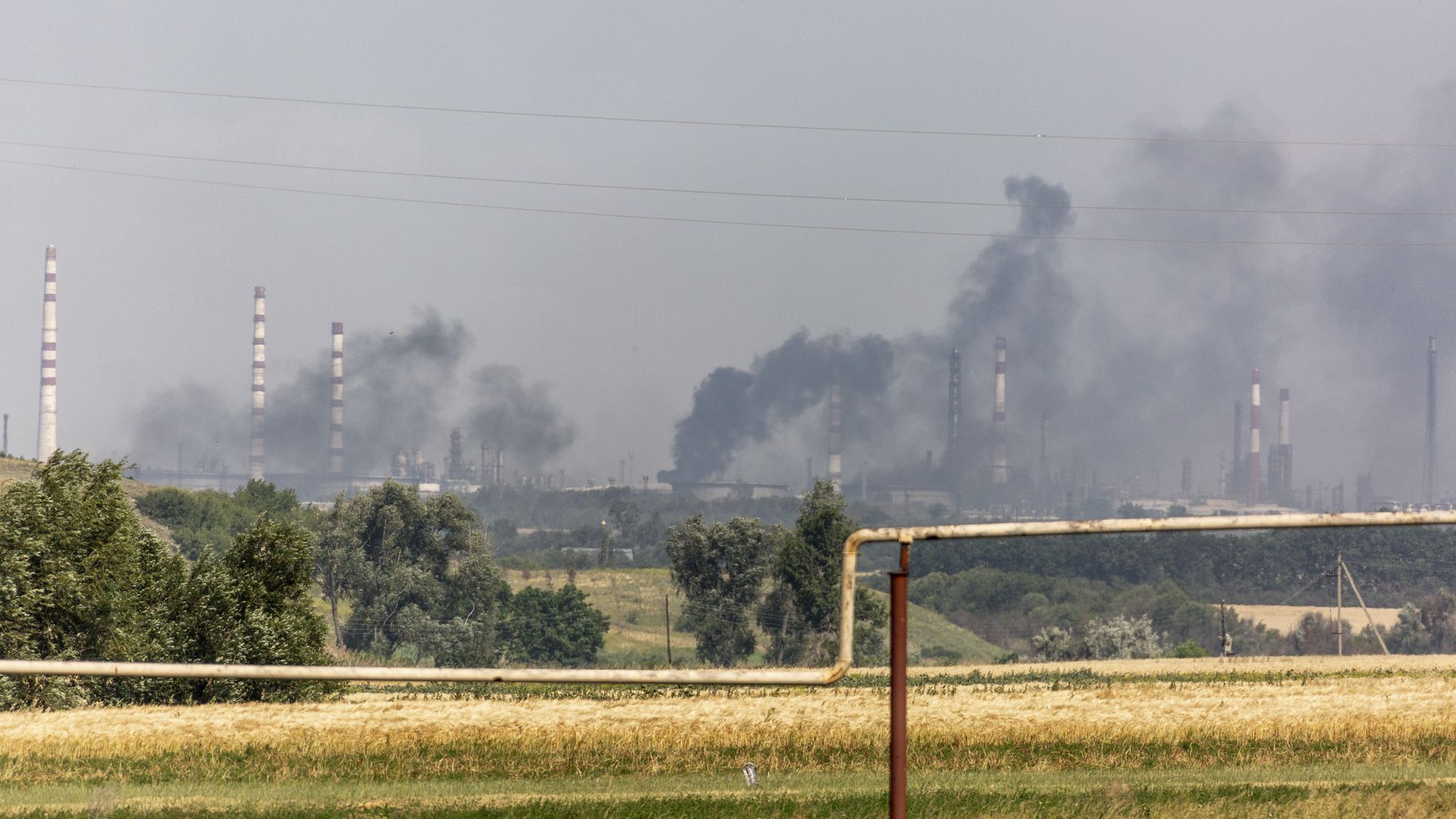 Plumbs of smoke are seen rising to the sky during heavy fighting between Ukrainian forces with Russian troops in Lysychansk,